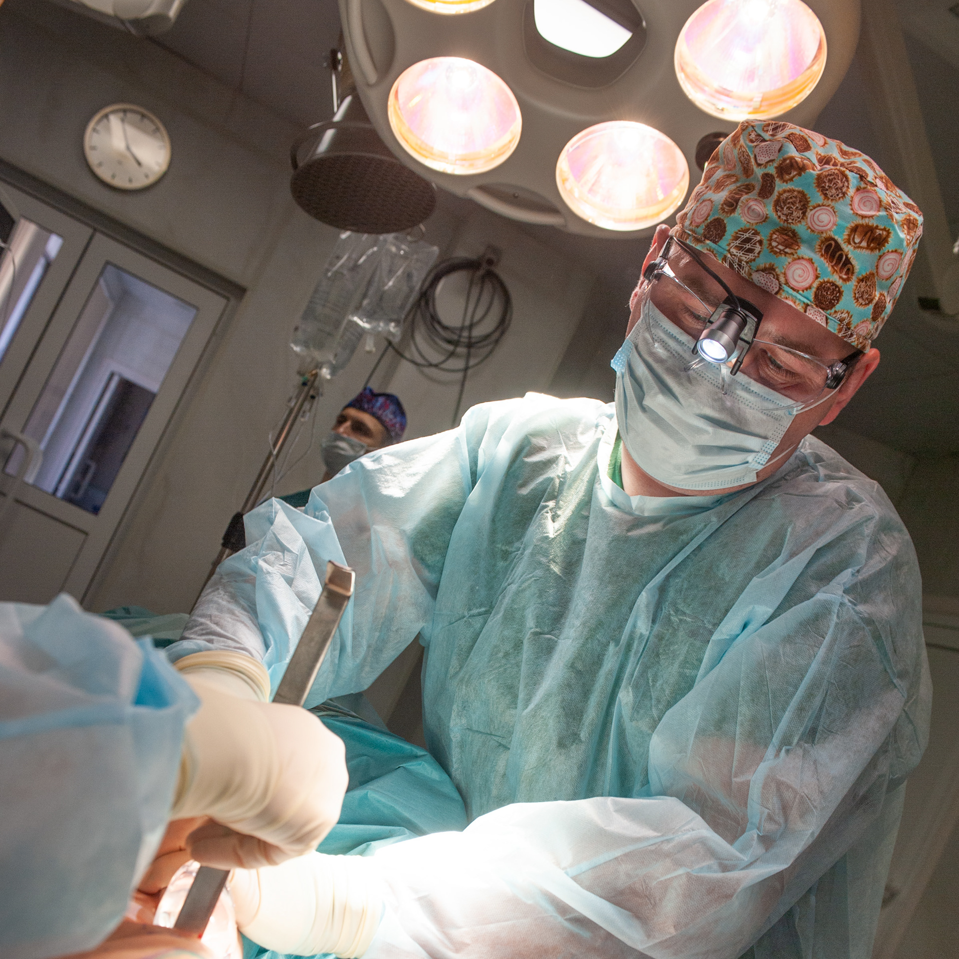 Surgeon in action for publication clinic's FB page