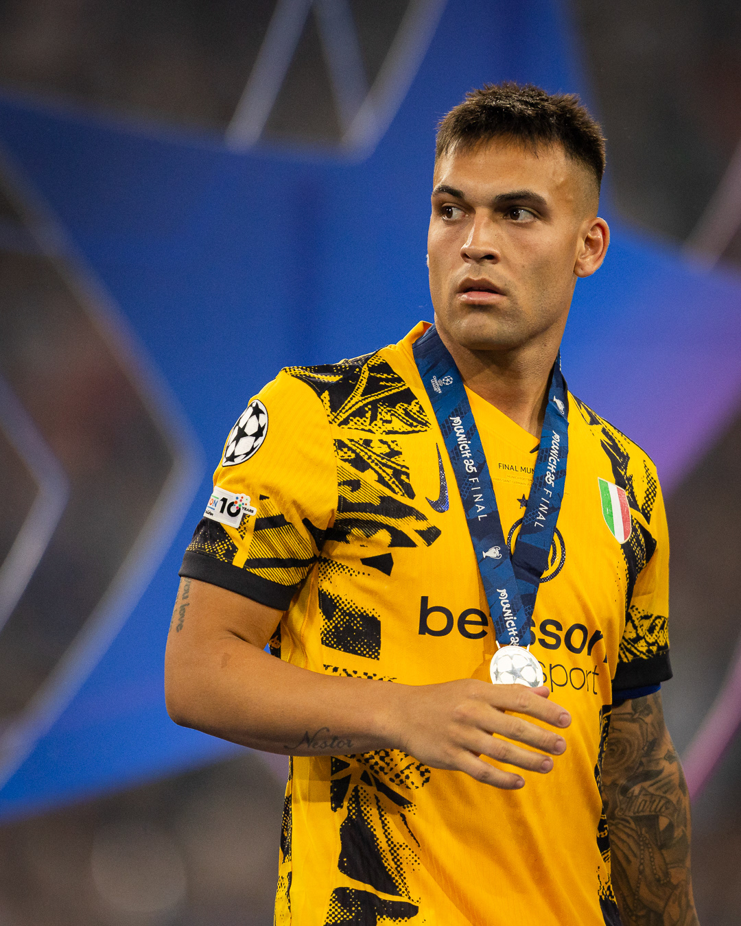 Lautaro Martinez of FC Internazionale Milano receives a silver medal at the UEFA Champions League final match against Paris Saint-Germain in Munich, Germany