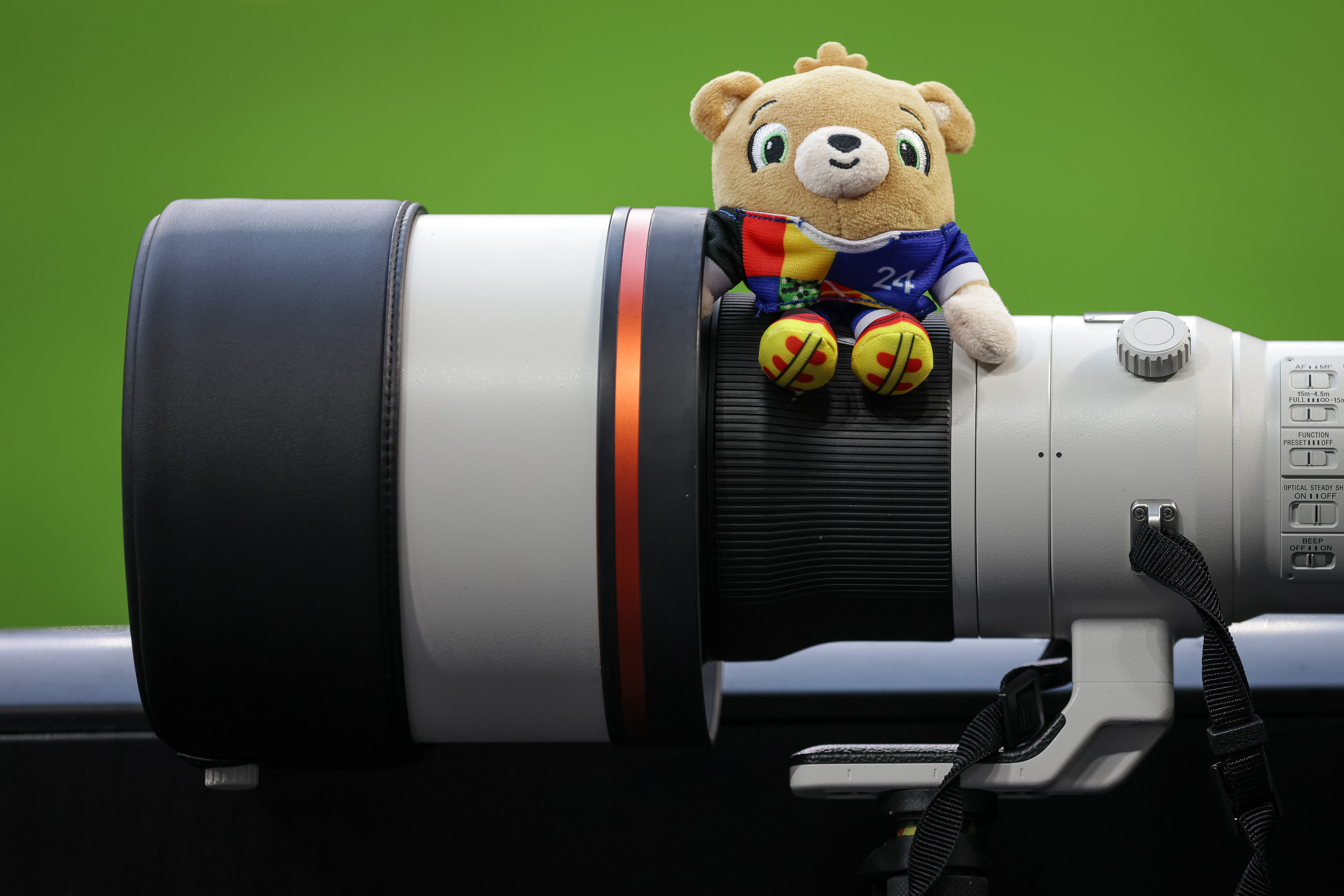 Mascot of the UEFA Euro 24 sits on a Sony lens