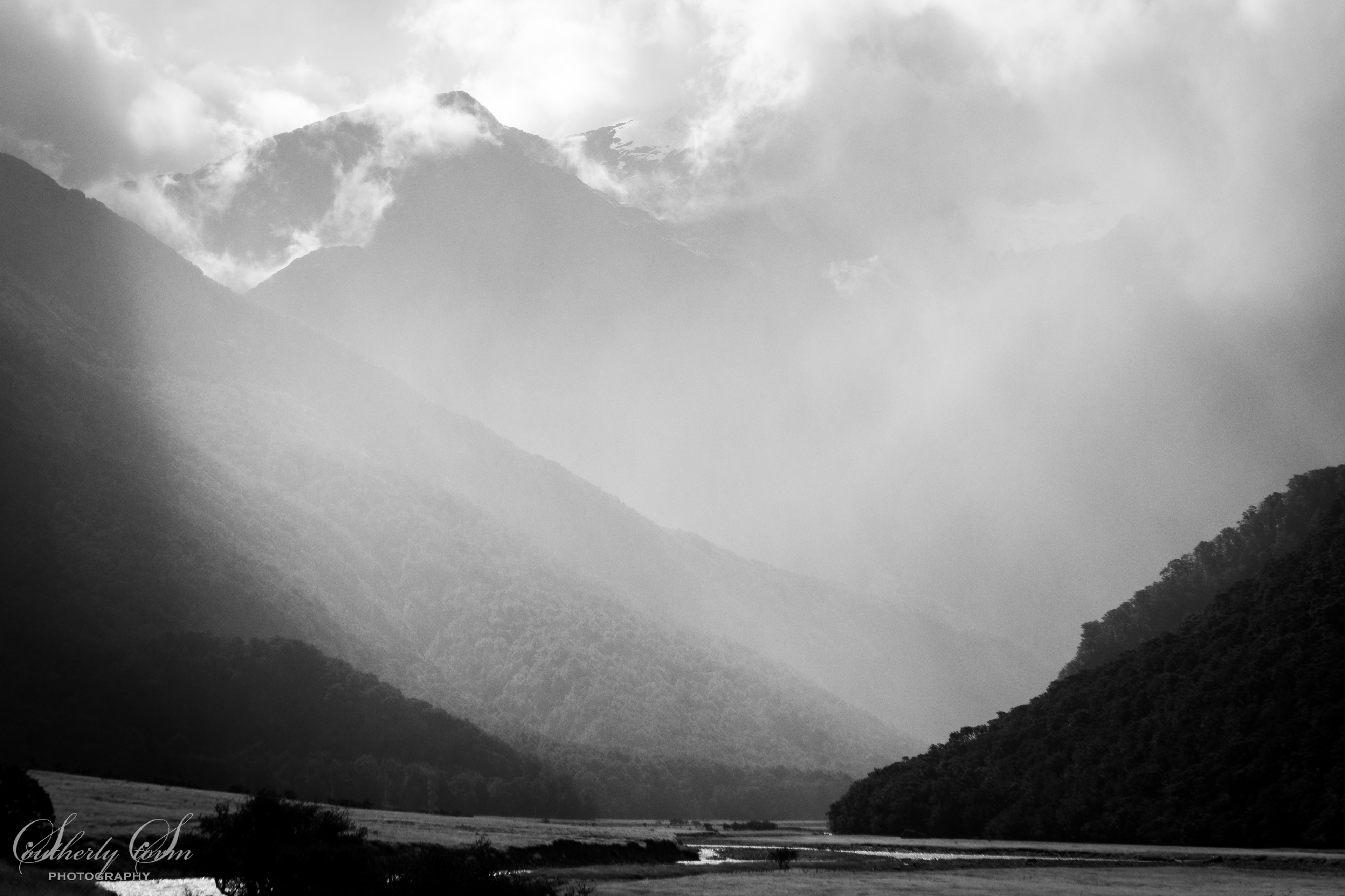 Black and White photo of rain in the matukituki valley