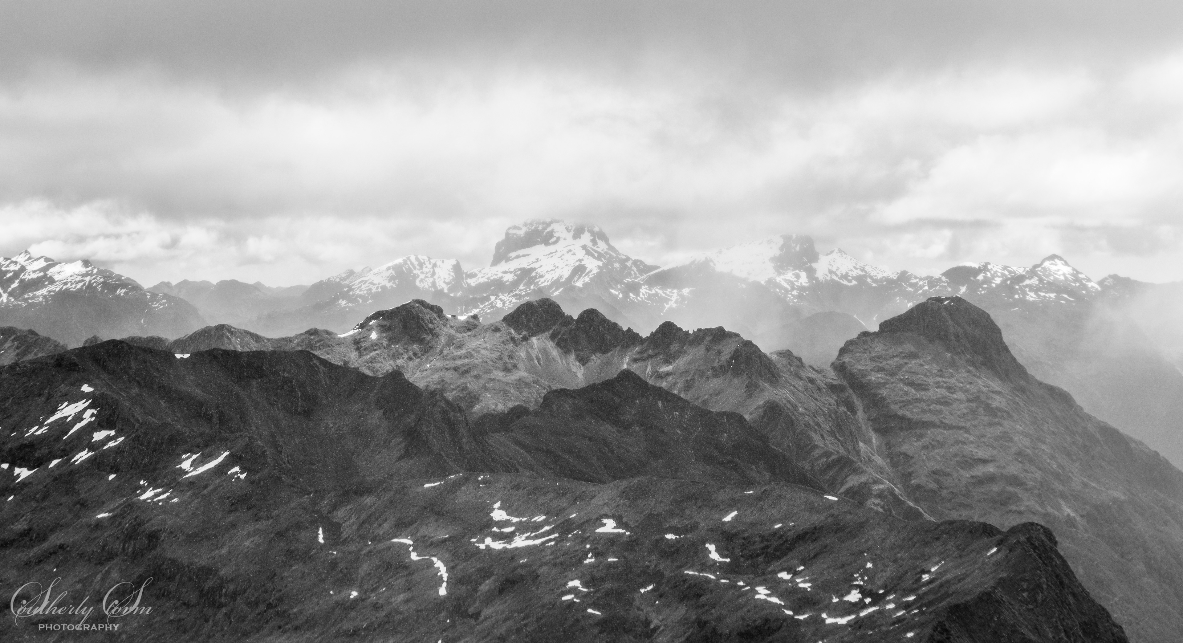 Black and white photo of mountains in Fiordland