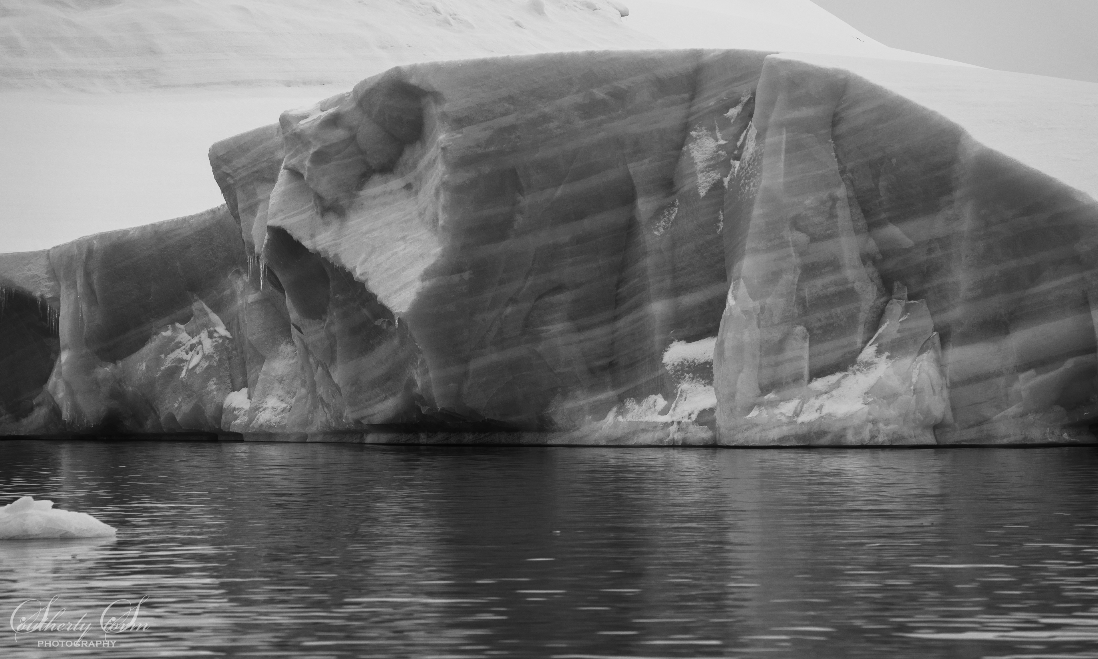 Black and white layers in the ice