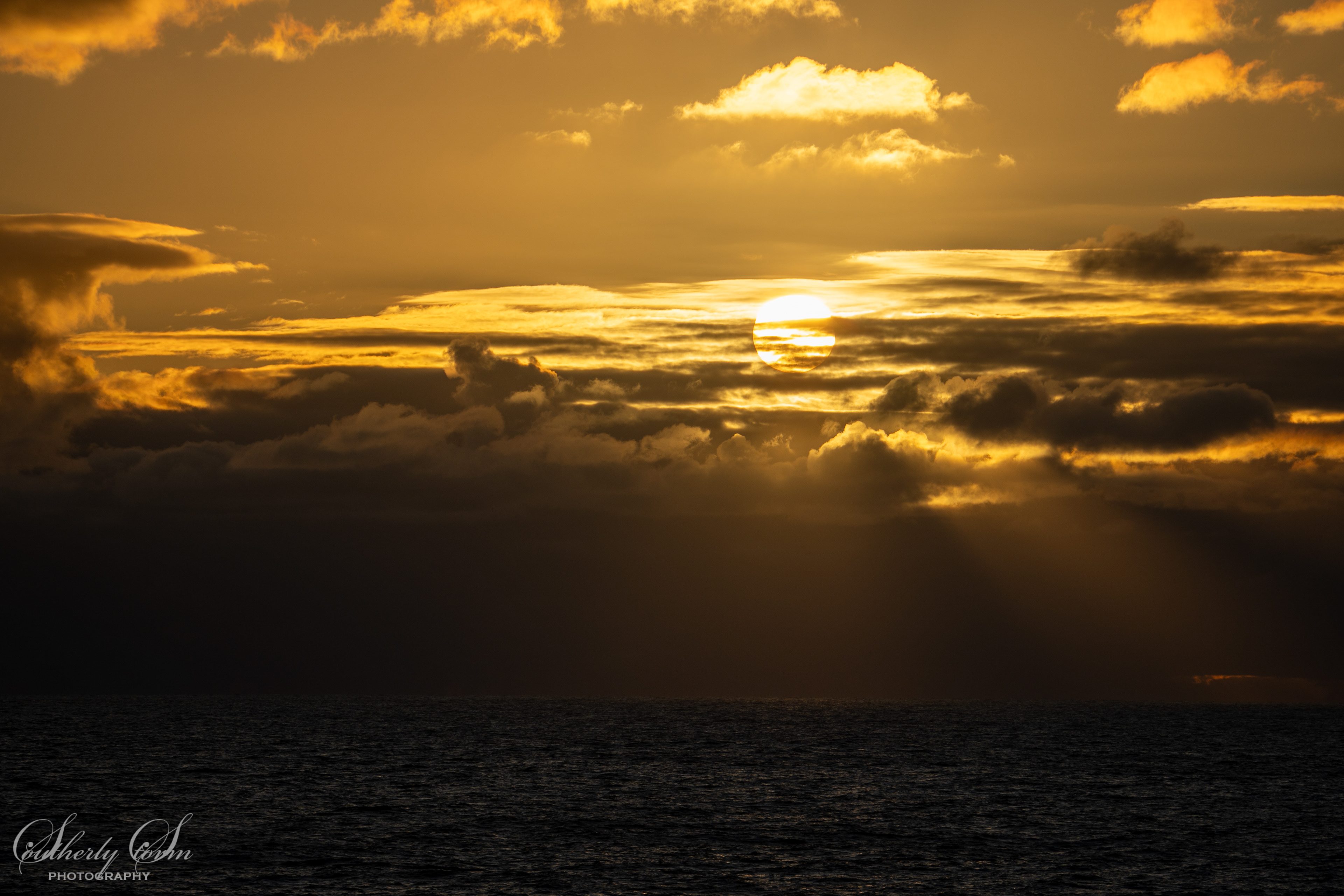 Golden sun over the Drake Passage