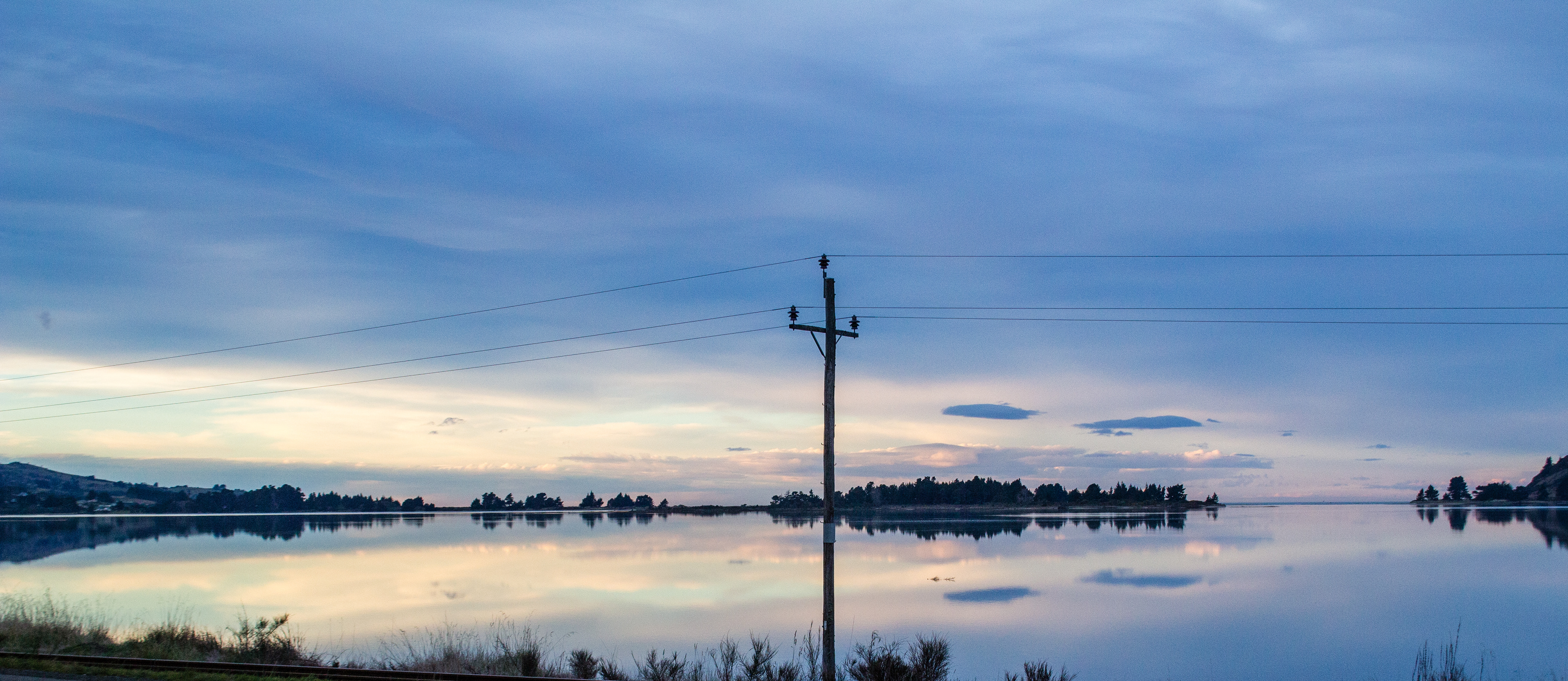 Power lines at sunset in blueskin bay