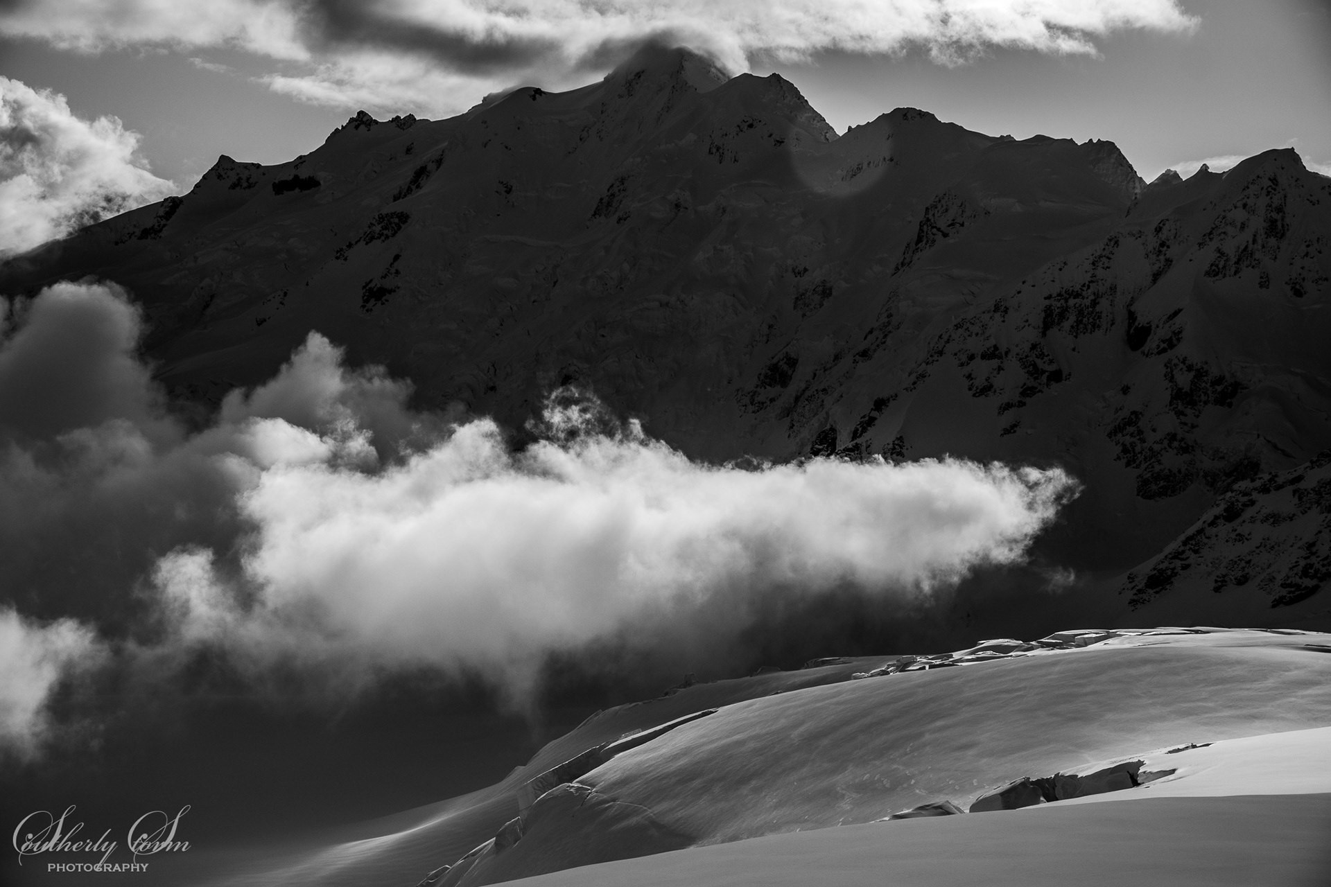 Black and white photo, clouds on the Tasman Glacier