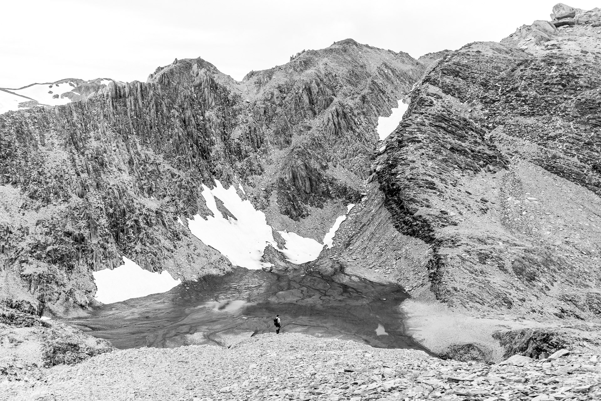 Black and White Tramper approaching Lake