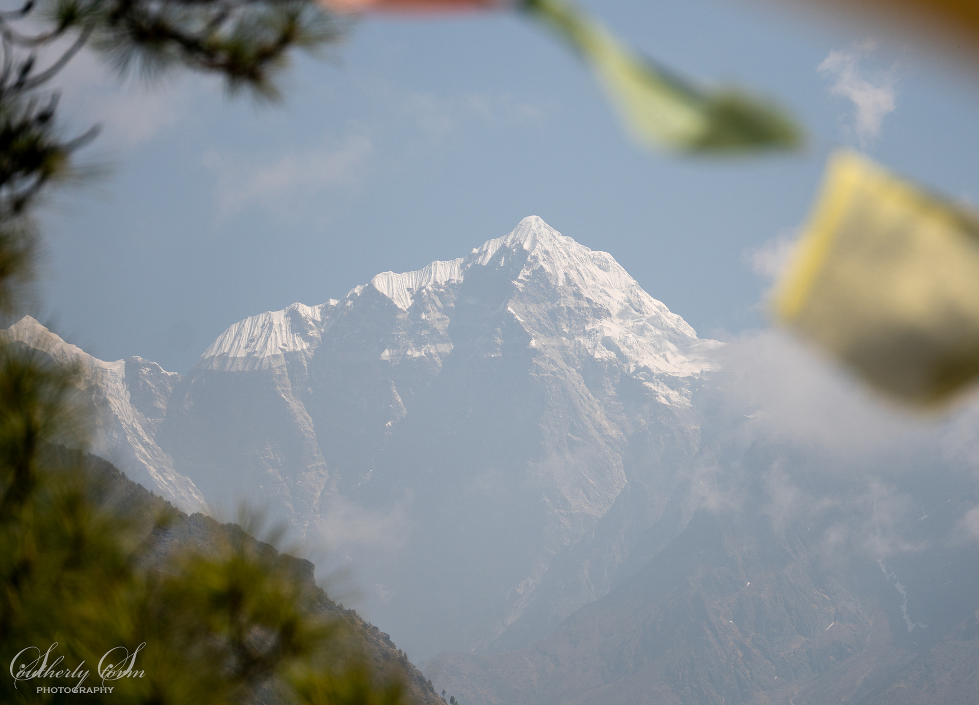 Mountain under a prayer flag in Nepal