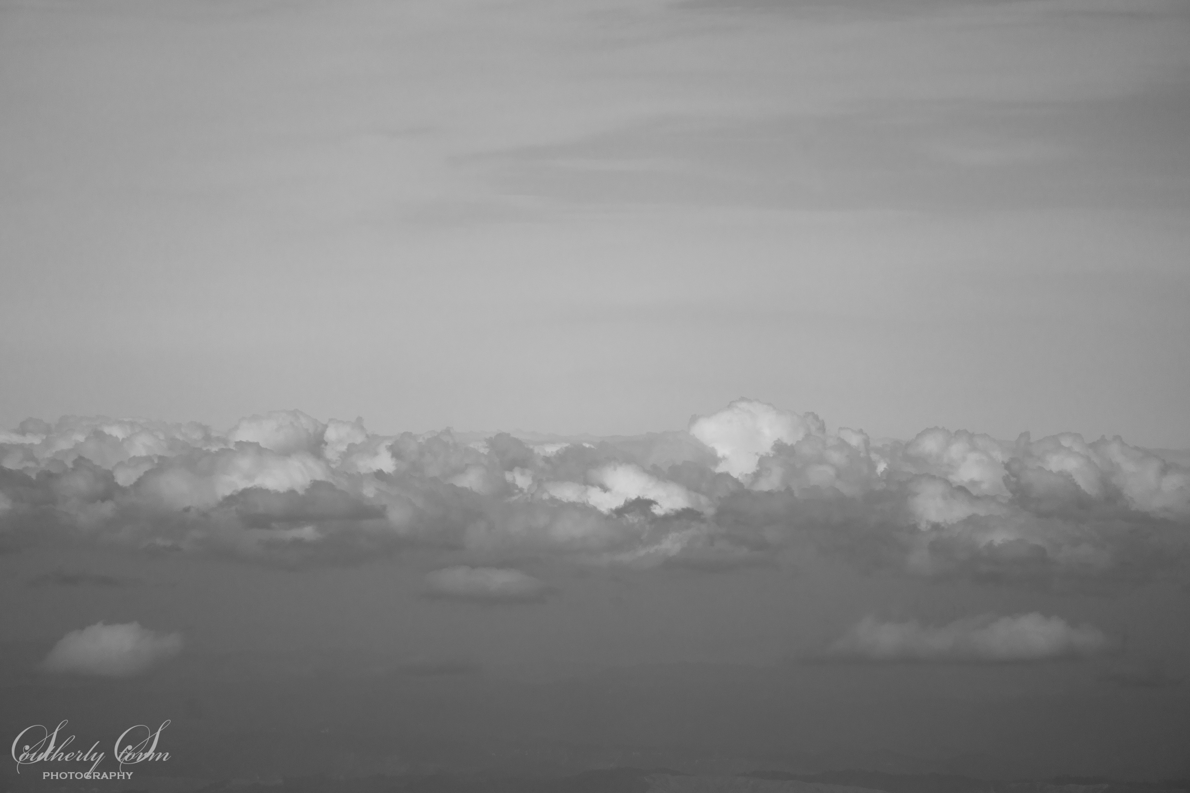 Black and white photo of clouds in the sky