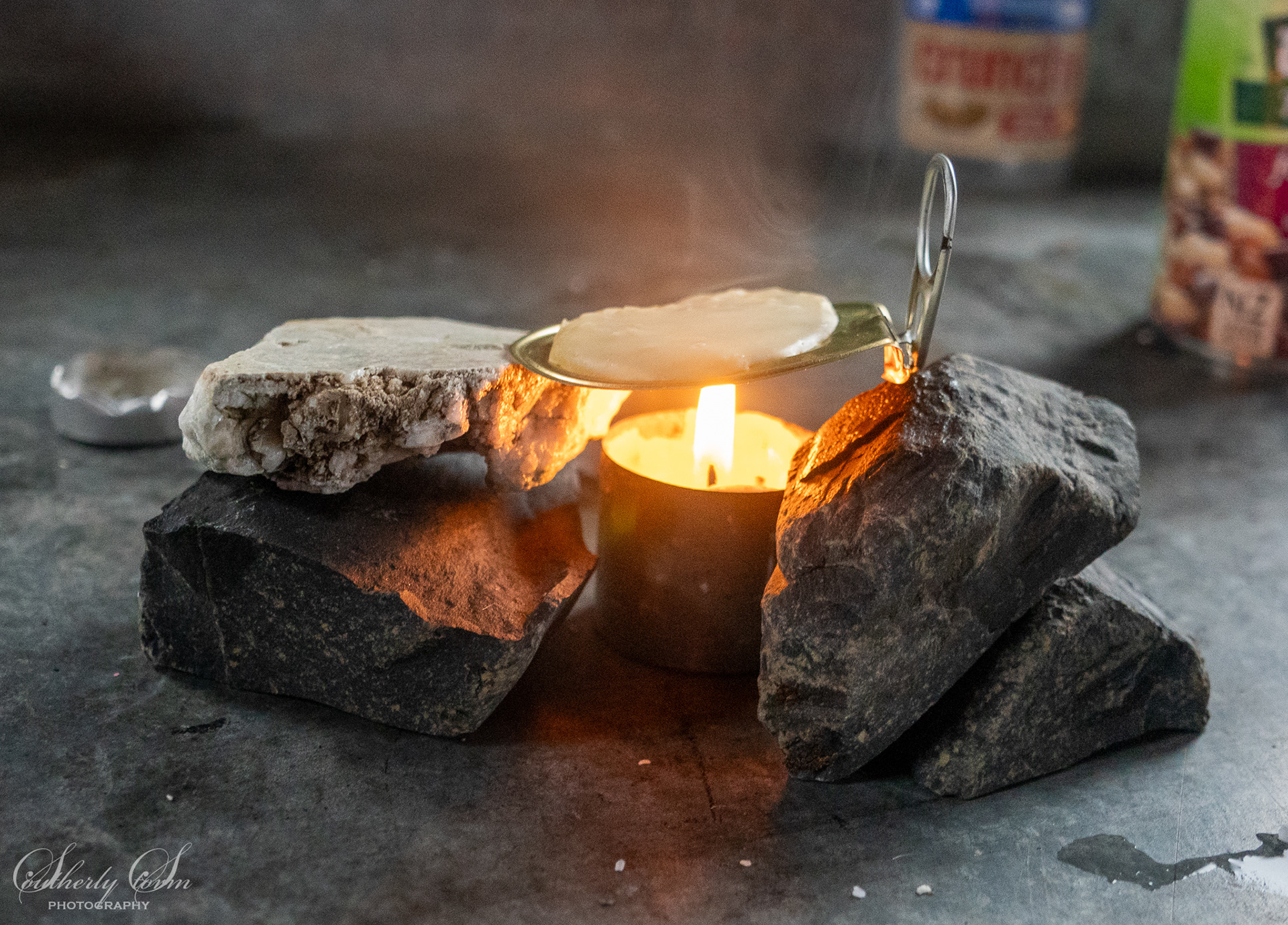 Cooking a pancake over a candle