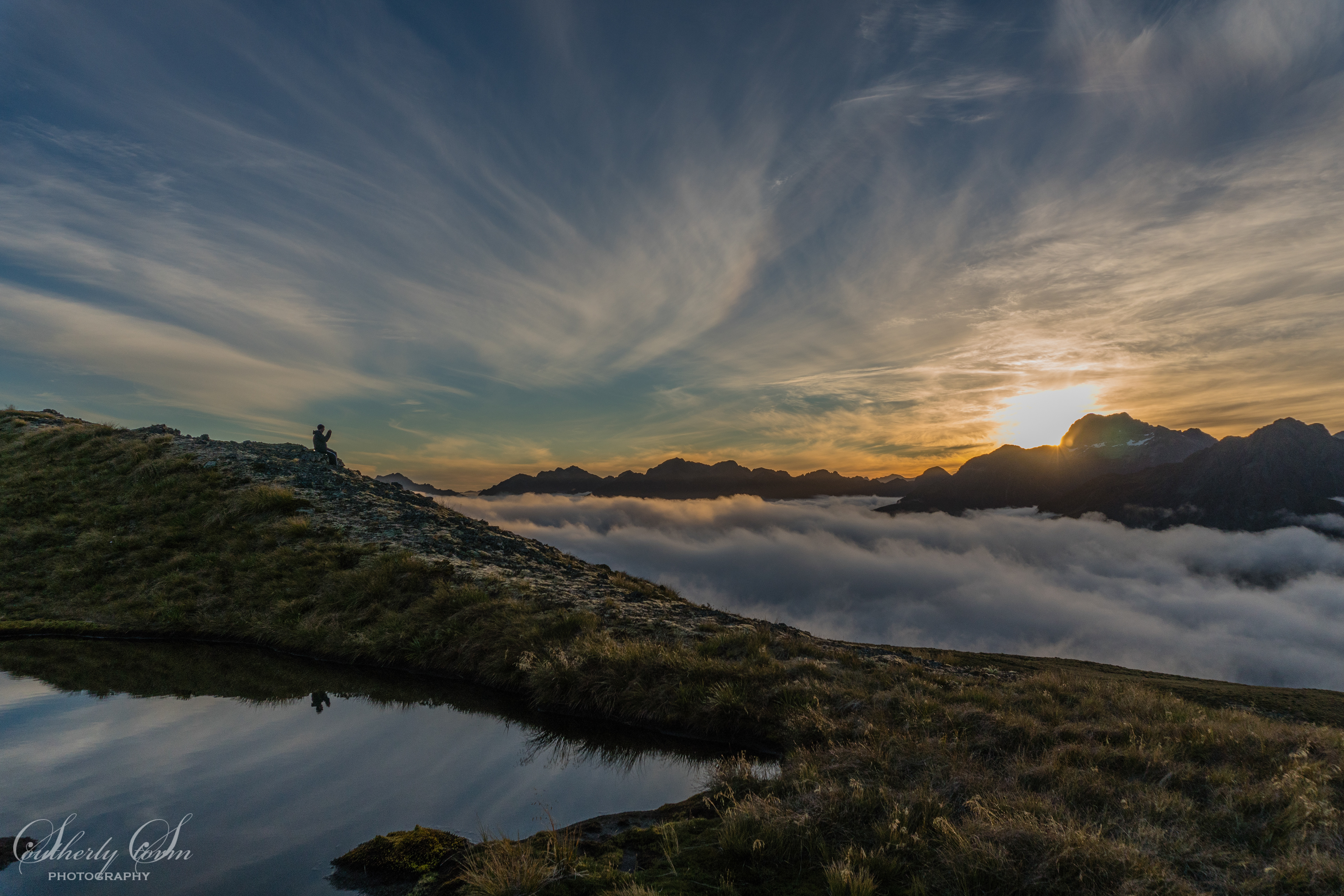 Reading at sunset, Livingstone Range