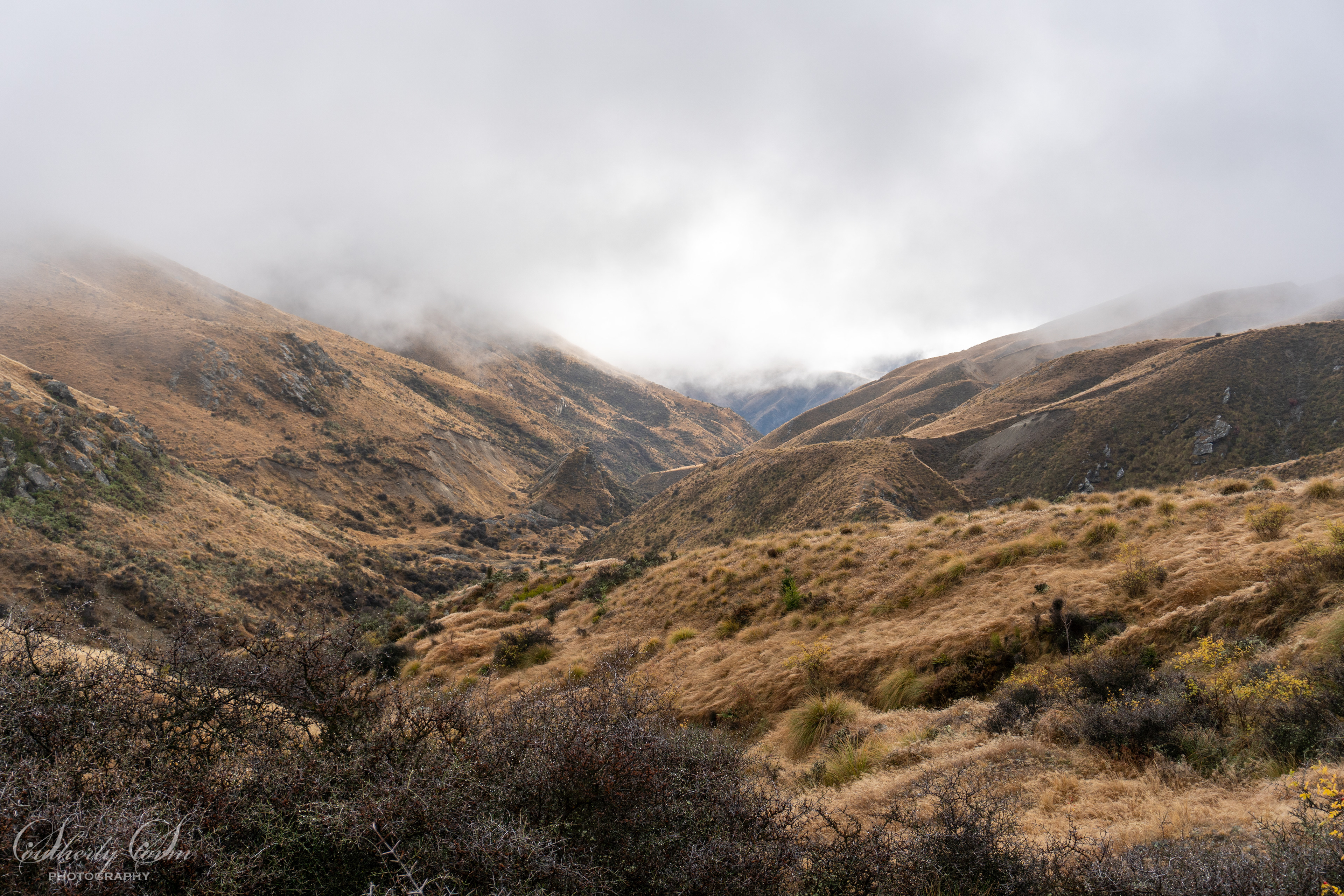 View on the Crown Range as fog begins to lift