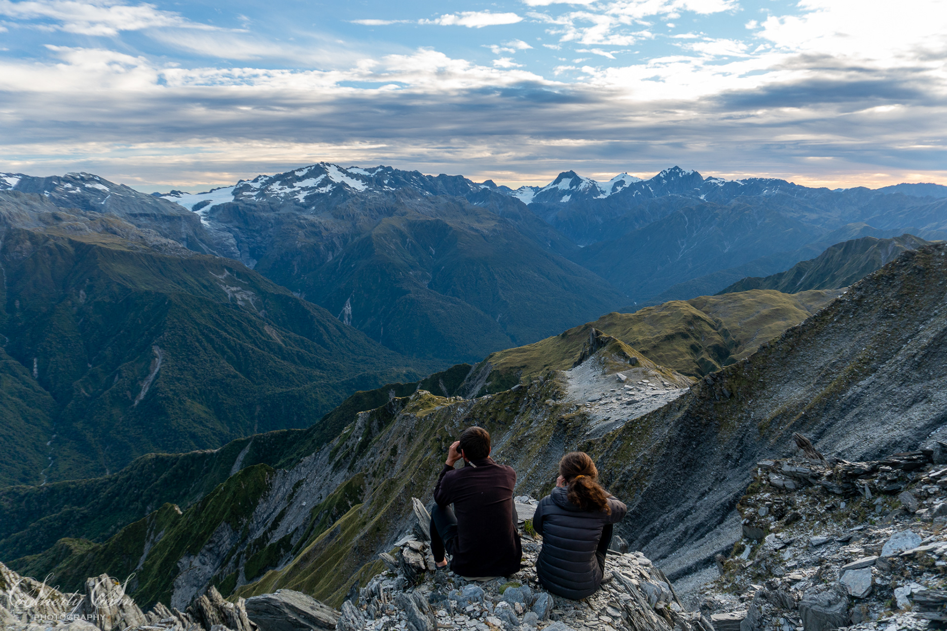 Two trampers enjoying the view
