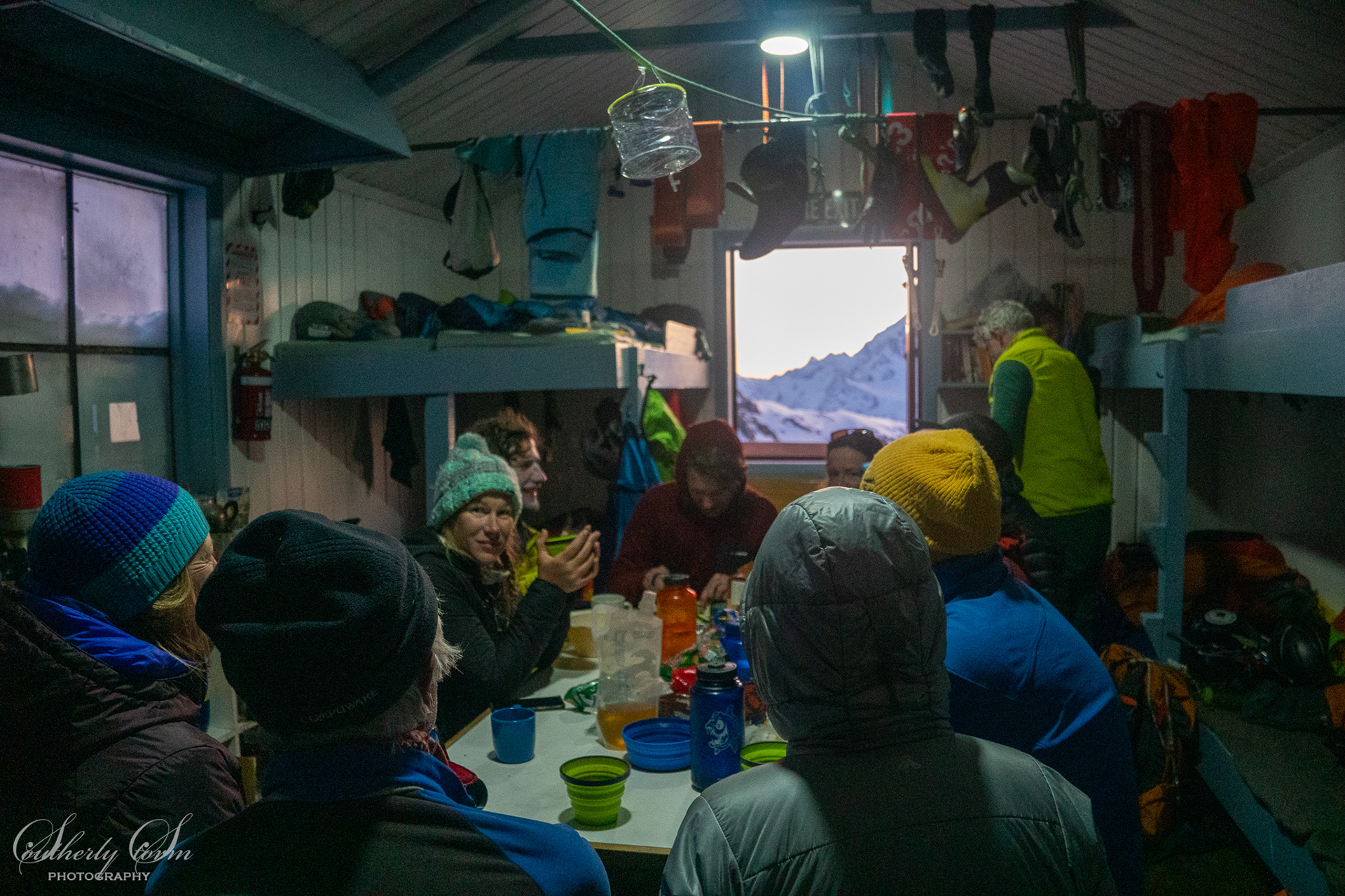 People inside Tasman Saddle Hut