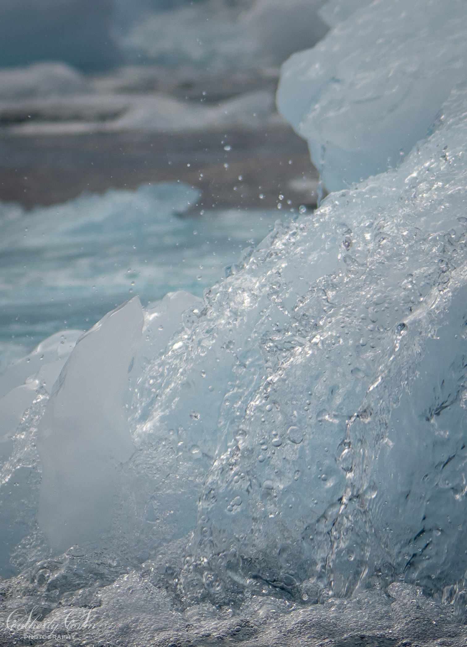 Water splashing against the ice