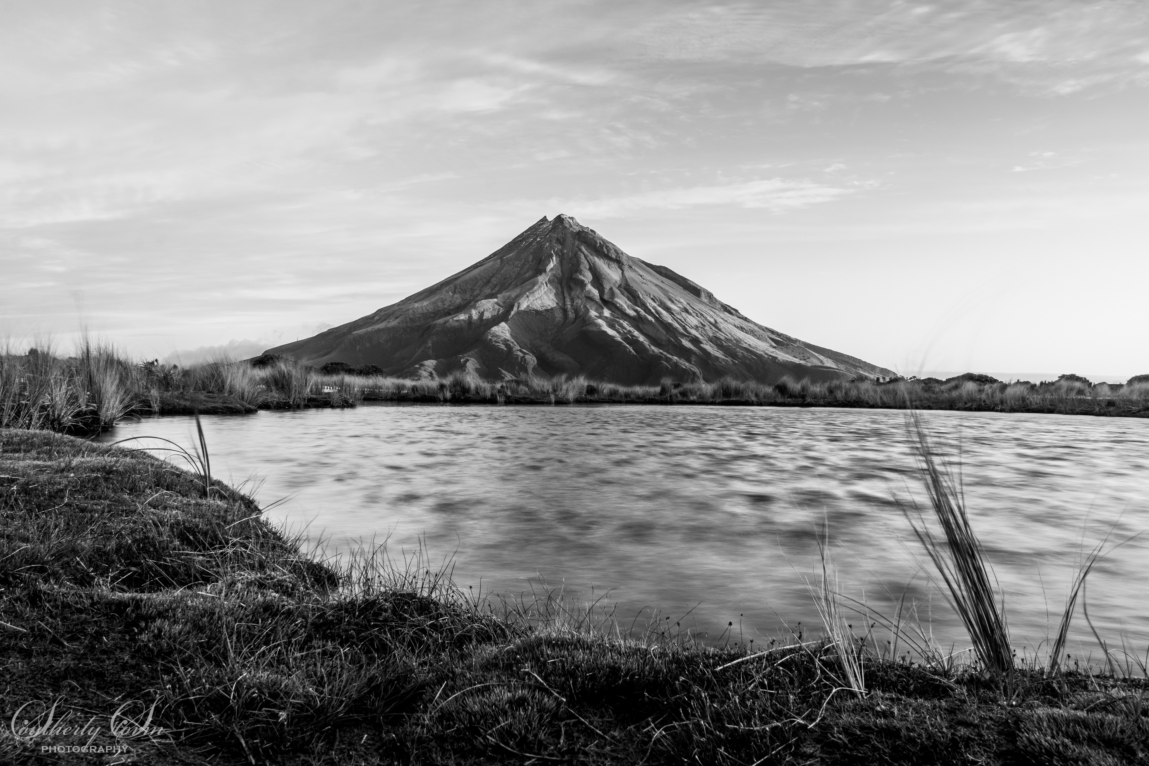 Black and white of Mt Taranaki from Pouakai Tarn