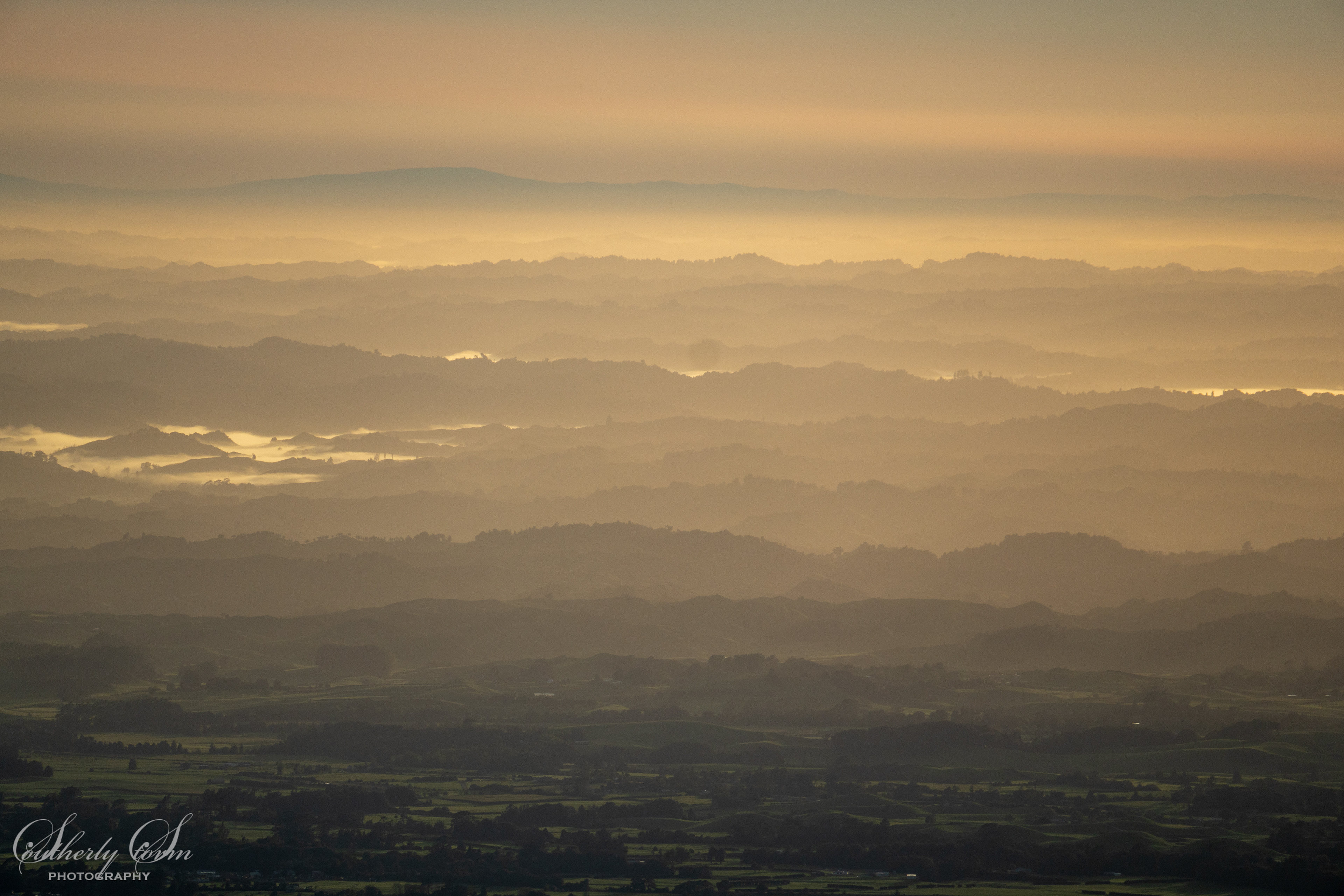 Layers of hills in early morning dusky light