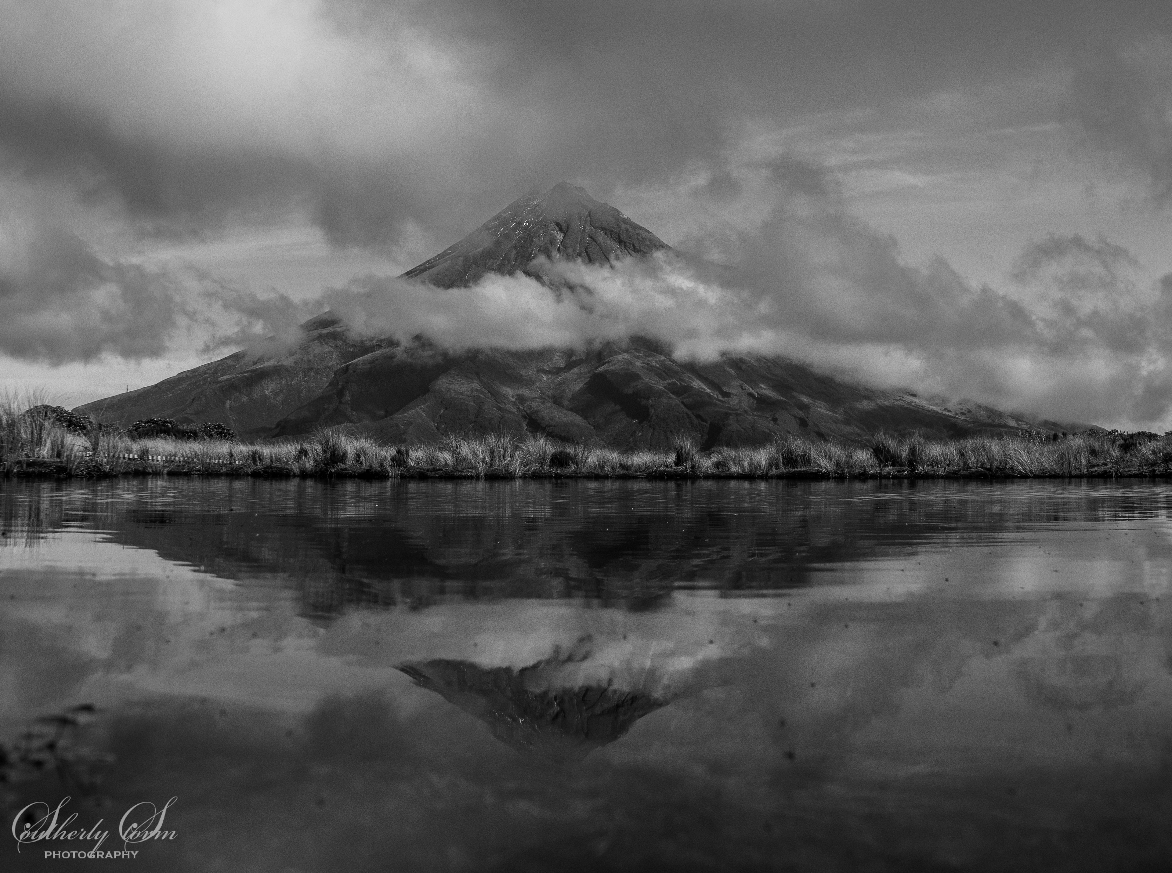 Mt Taranaki reflected in Pouakai Tarn in Black and White