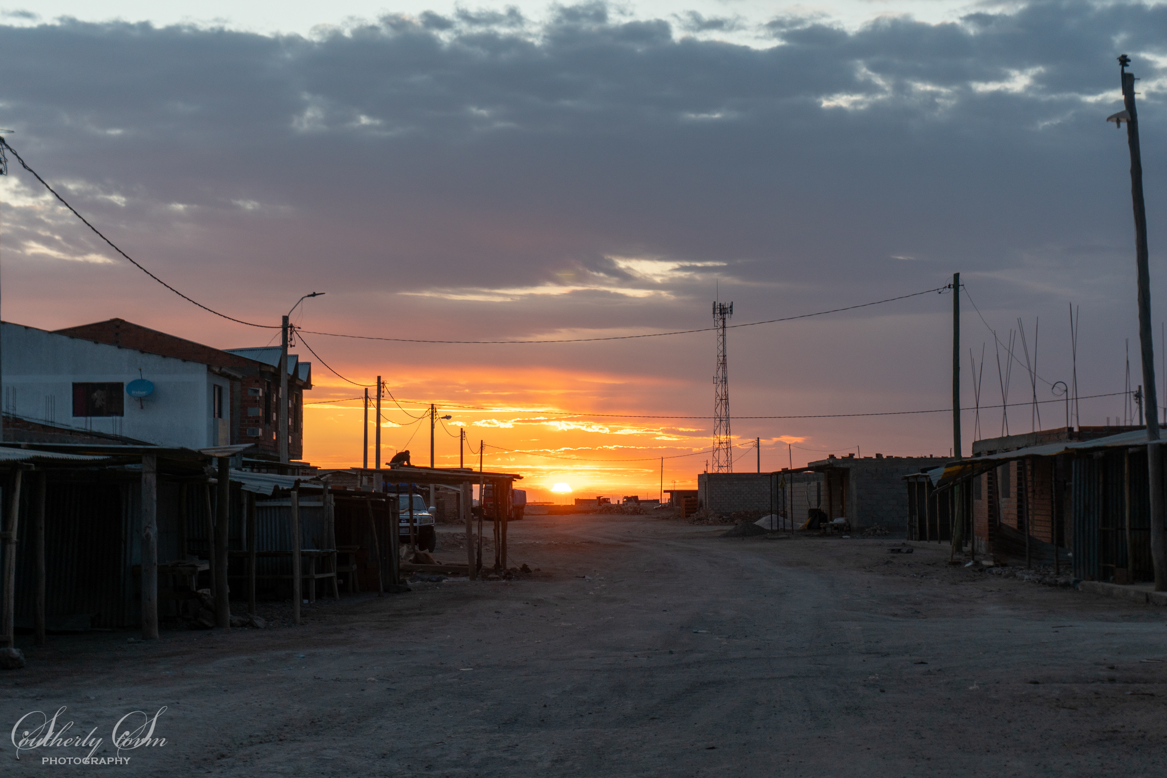 Sunset on the end of the salt flats in Bolivia