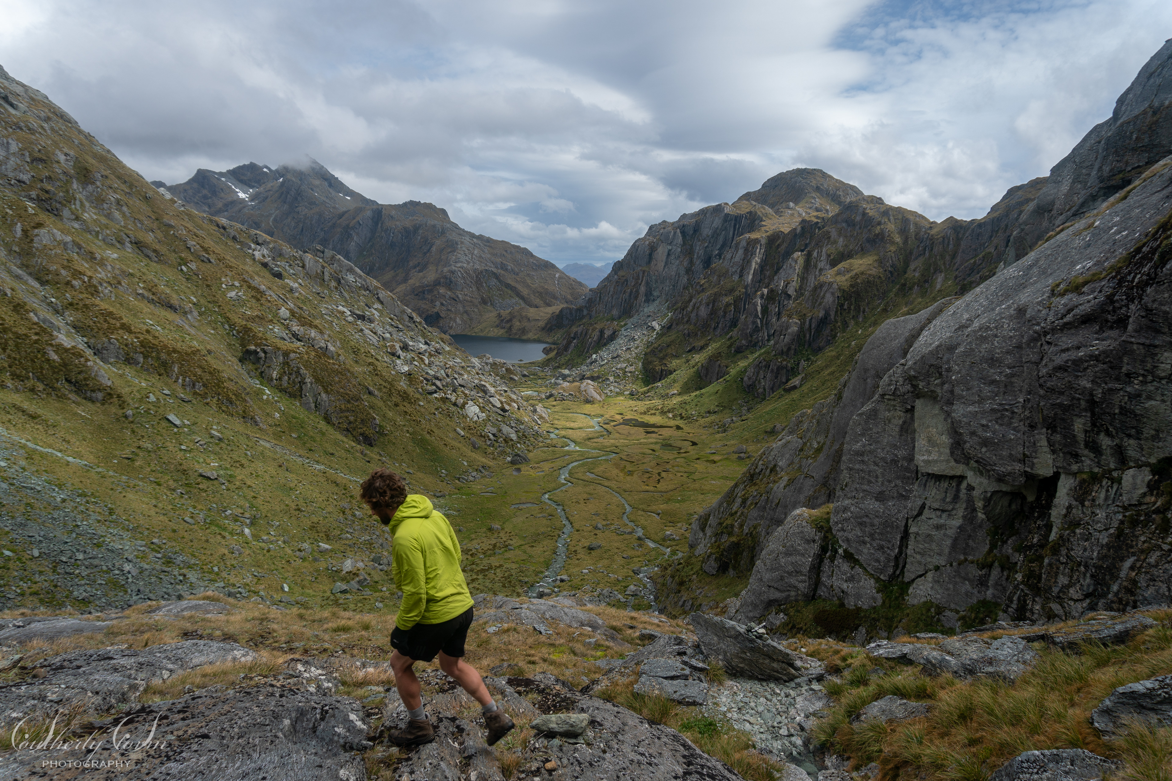 Tramper above Valley of the Trolls and Lake Harris