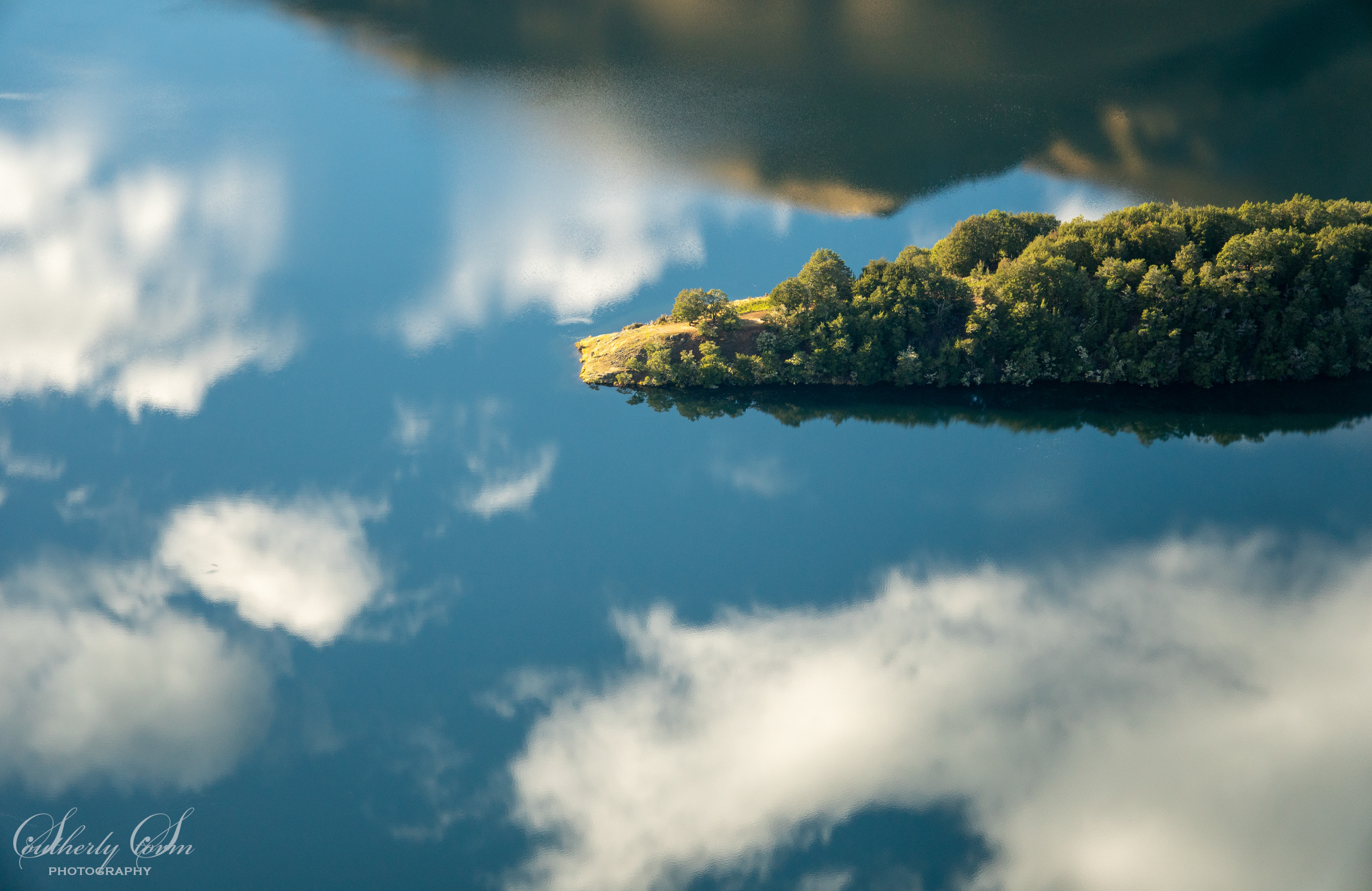 Moke Lake reflecting the sky