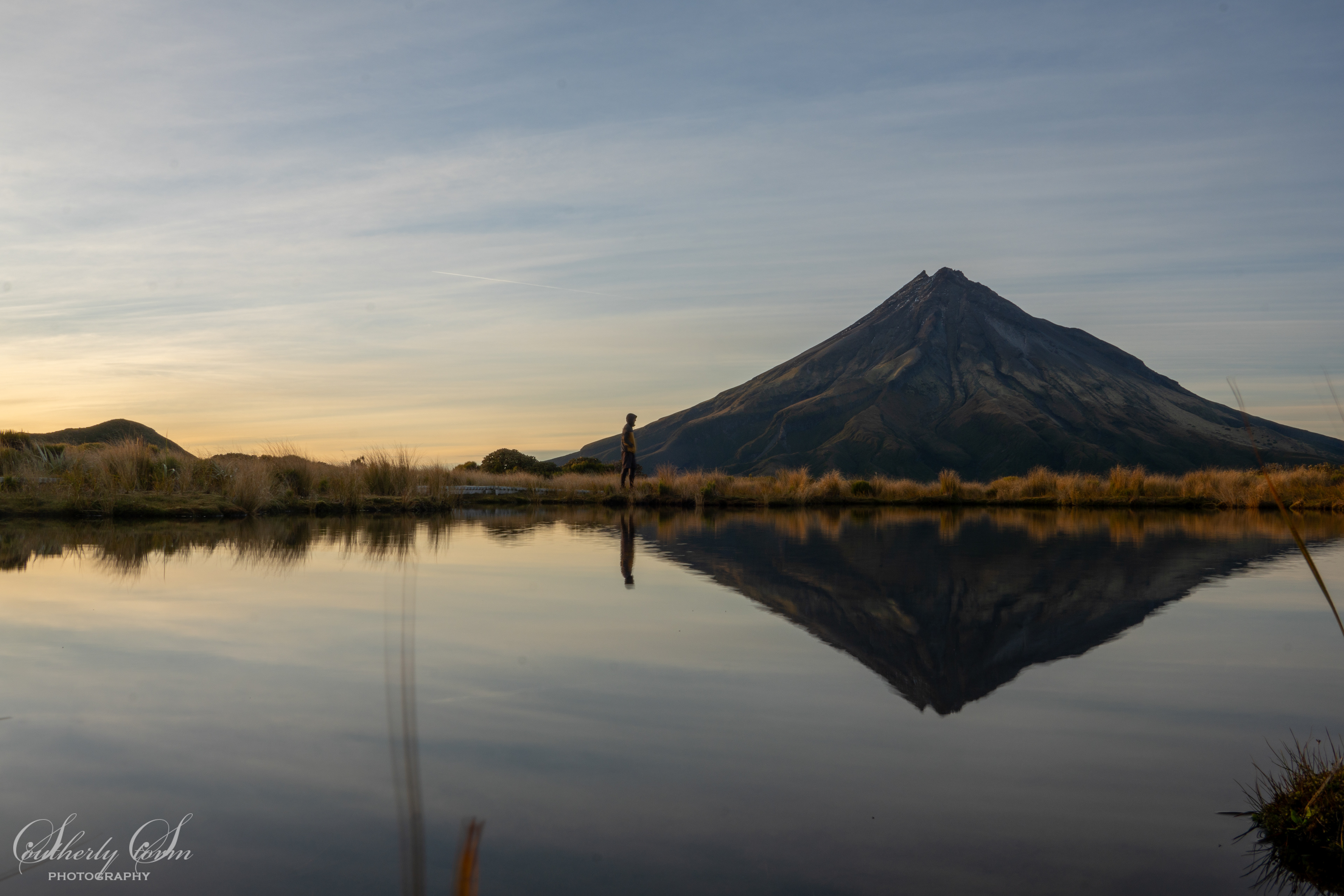 Mt Taranaki reflected in Pouakai Tarn at dawn