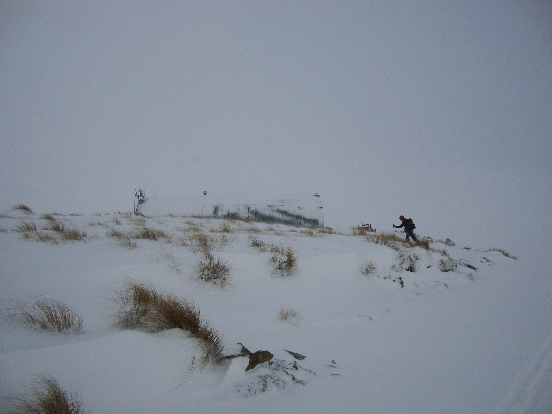 Skier approaches a hut at Awakino Ski Area