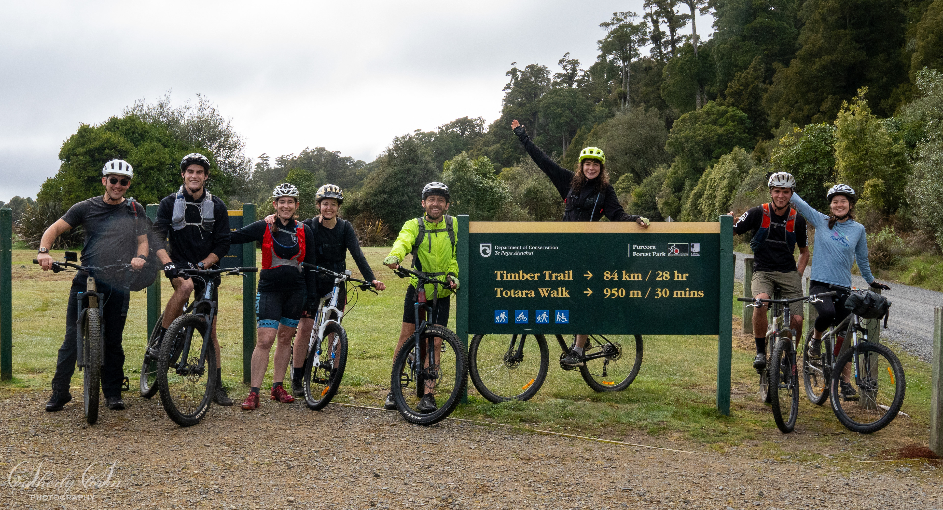 Group of people on bikes at the start of the Timber Trail