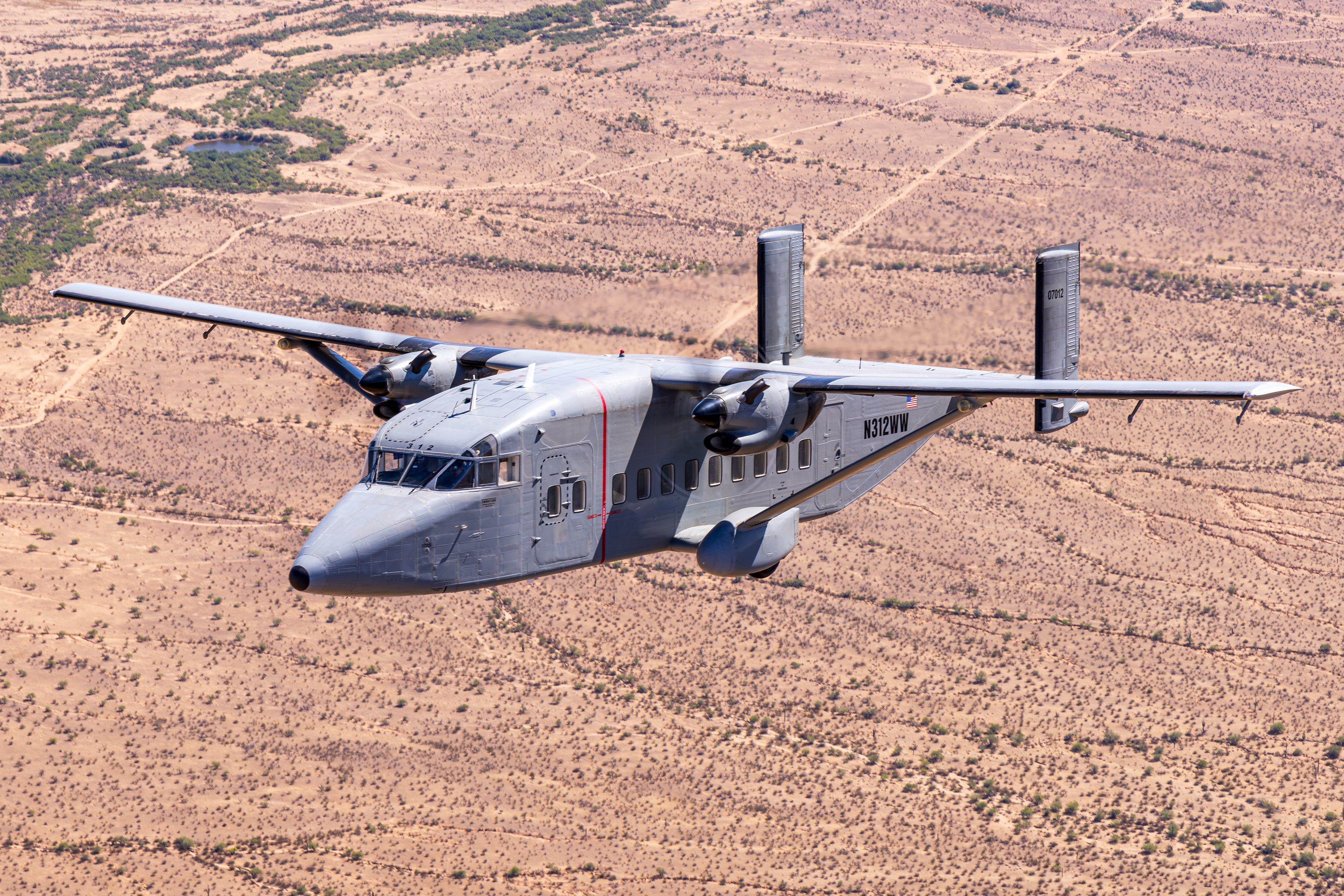 N312WW Short C-23B Sherpa air to air over the Superstition Mountains Arizona