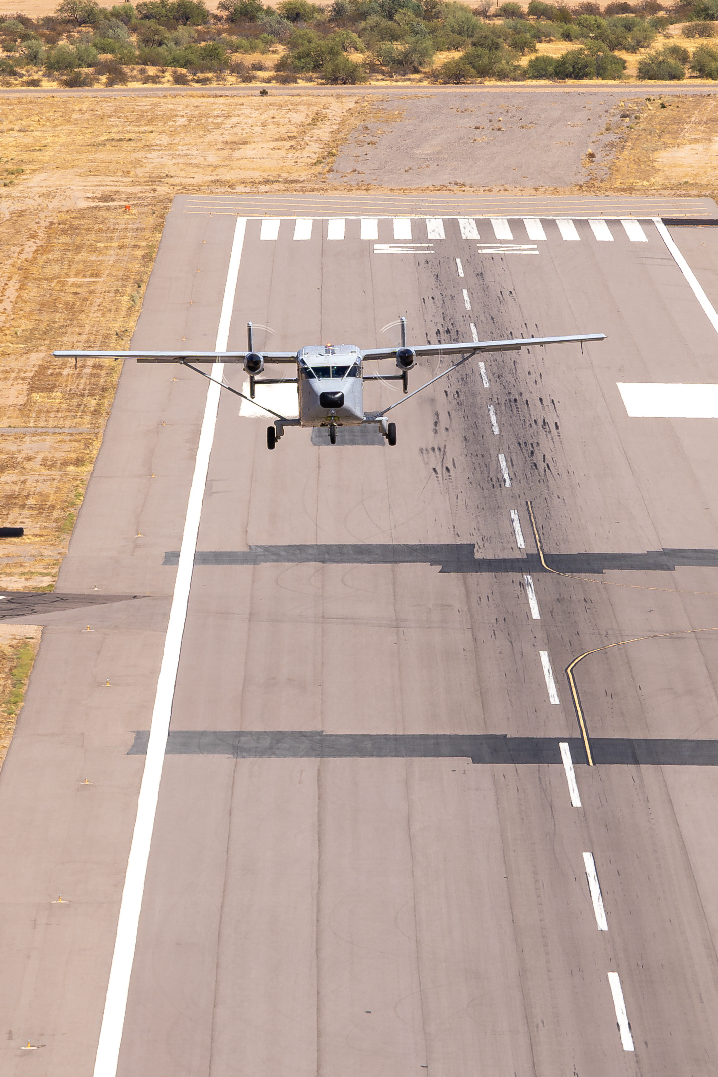 Short Skyvan taking off from Coolidge Municipal Airport Arizona, photographed from the ramp of another Short Skyvan
