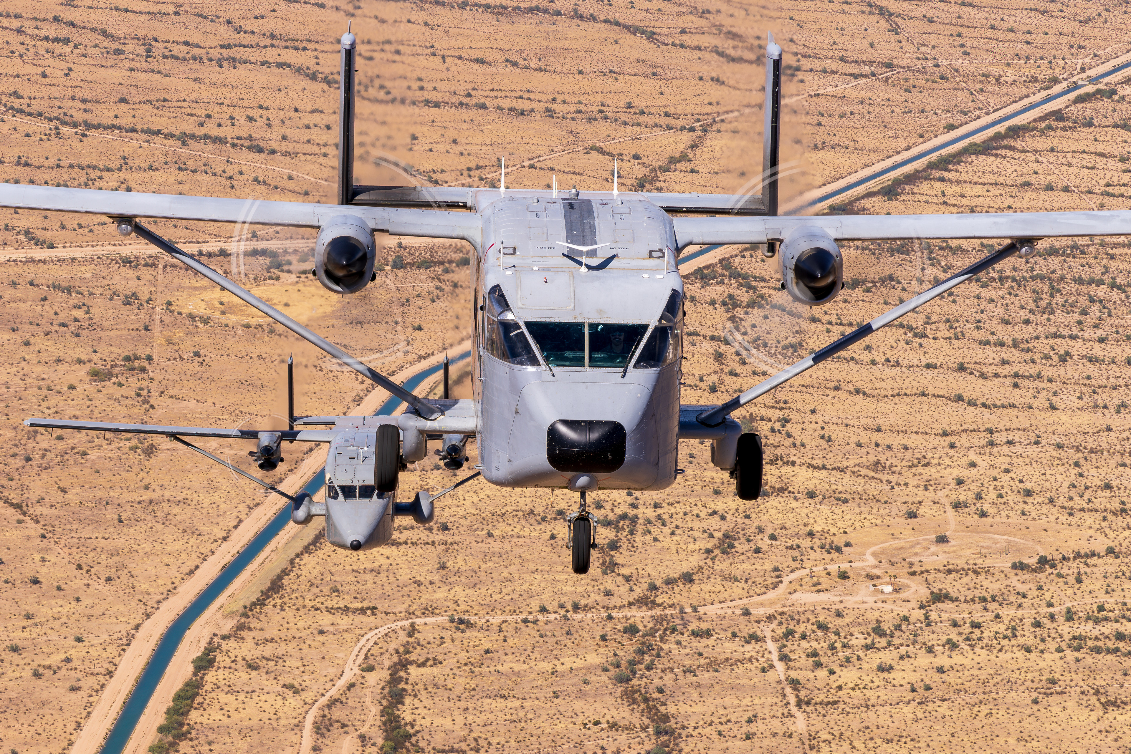 SHORTS SC 7 SKYVAN and Short C-23B Sherpa air to air over the Superstition Mountains Arizona