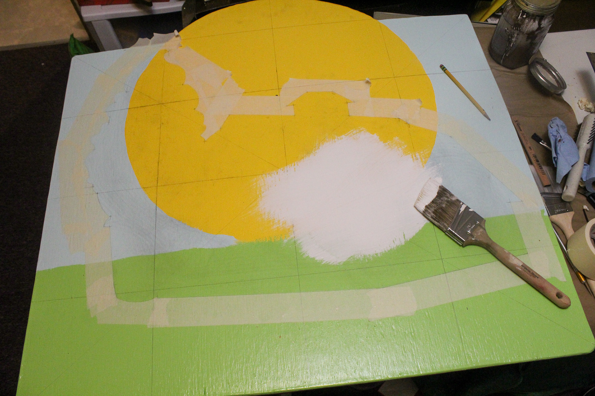 To maximize the graphic’s adhesion to the already painted sign, I applied a base layer of primer formulated to adhere to glossy surfaces. Using a simple grid, I manually plotted the silhouette of the design and drew the grid back in over the primer once it dried.