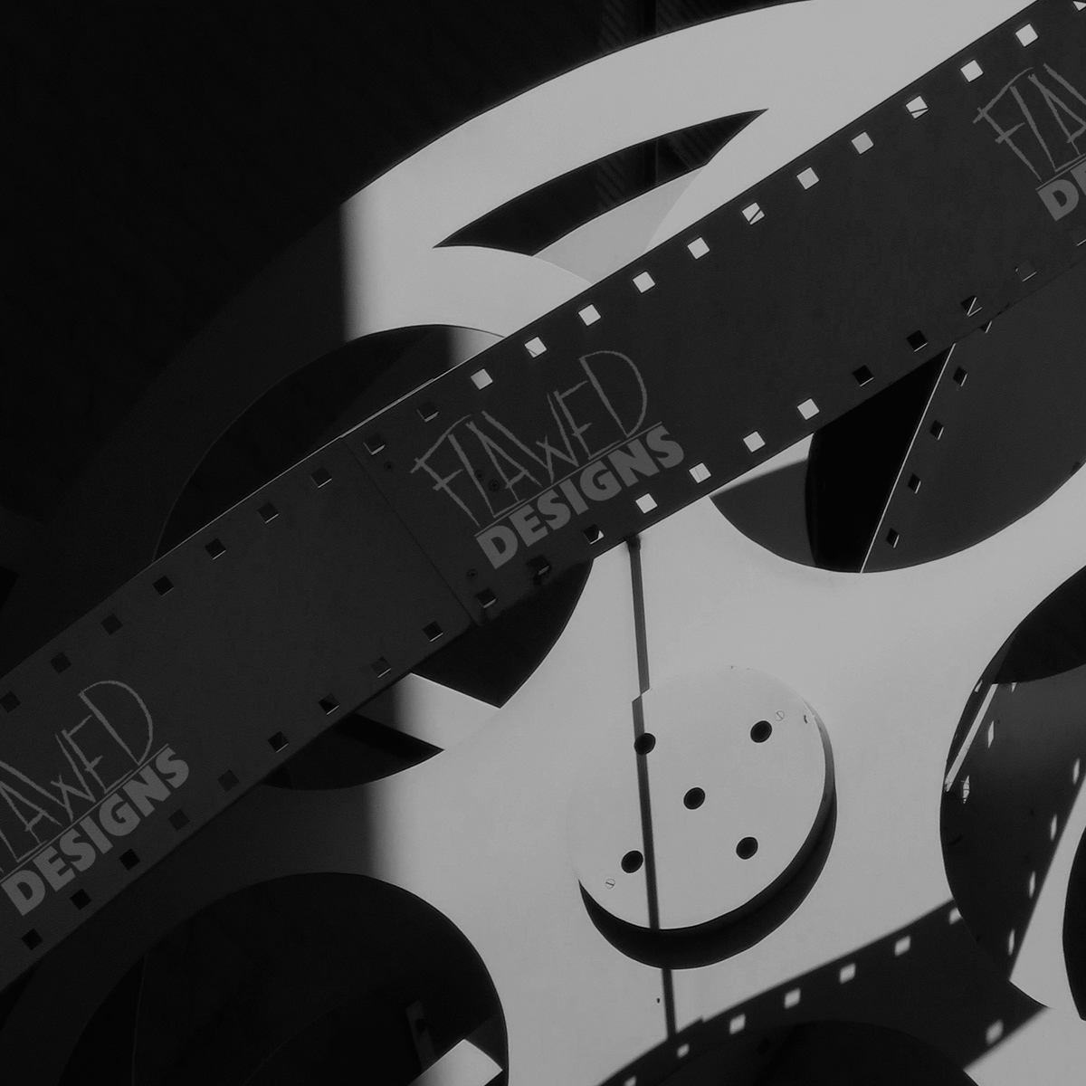 Flawed Designs Production Company Logo