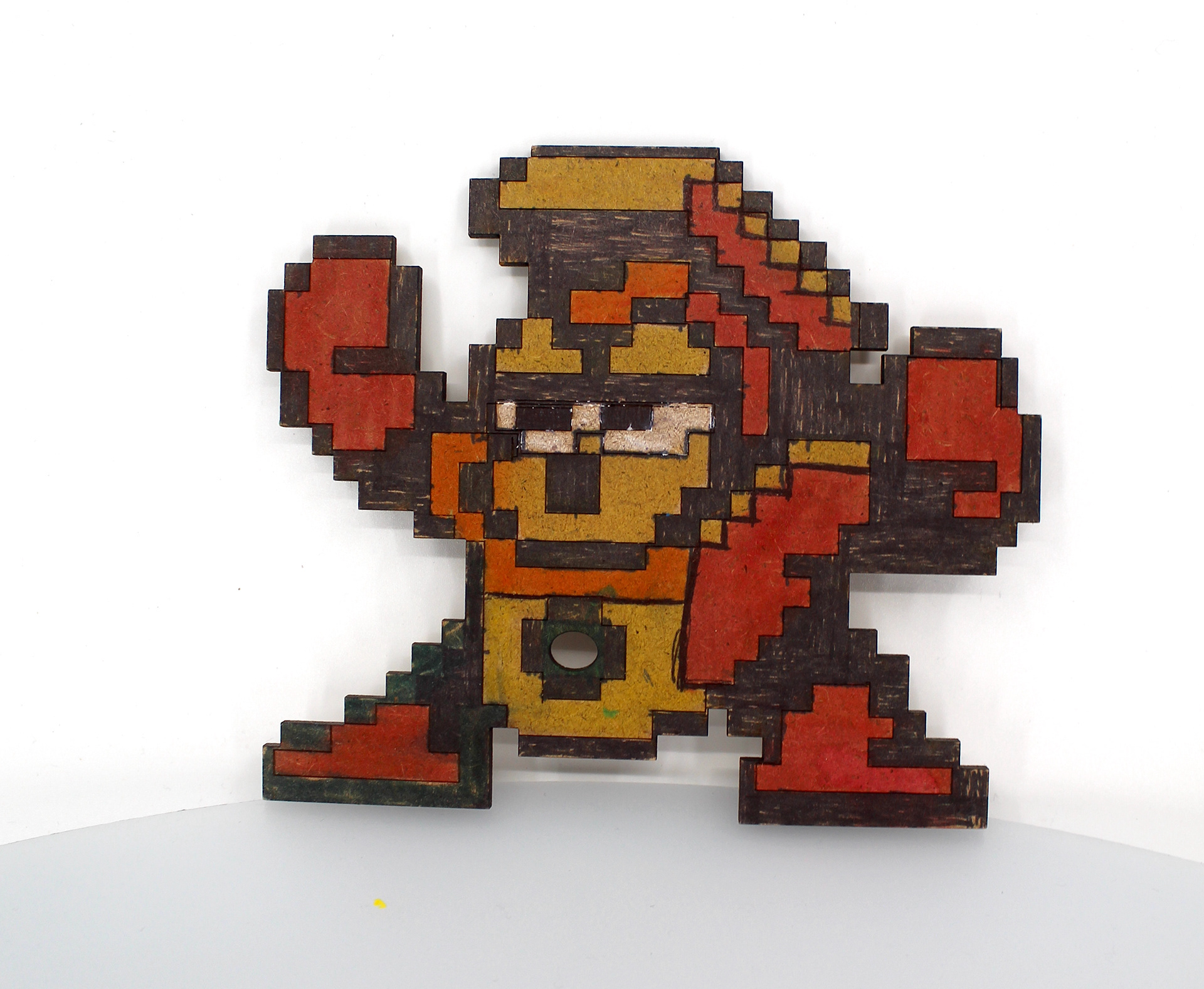 Rafael Rolon - "Heat Man" - Mega Man  A fire themed robot created by Dr. Wily to battle Mega Man. The atomic fire can be charged to destroy things.  I used paint and wood as my medium.