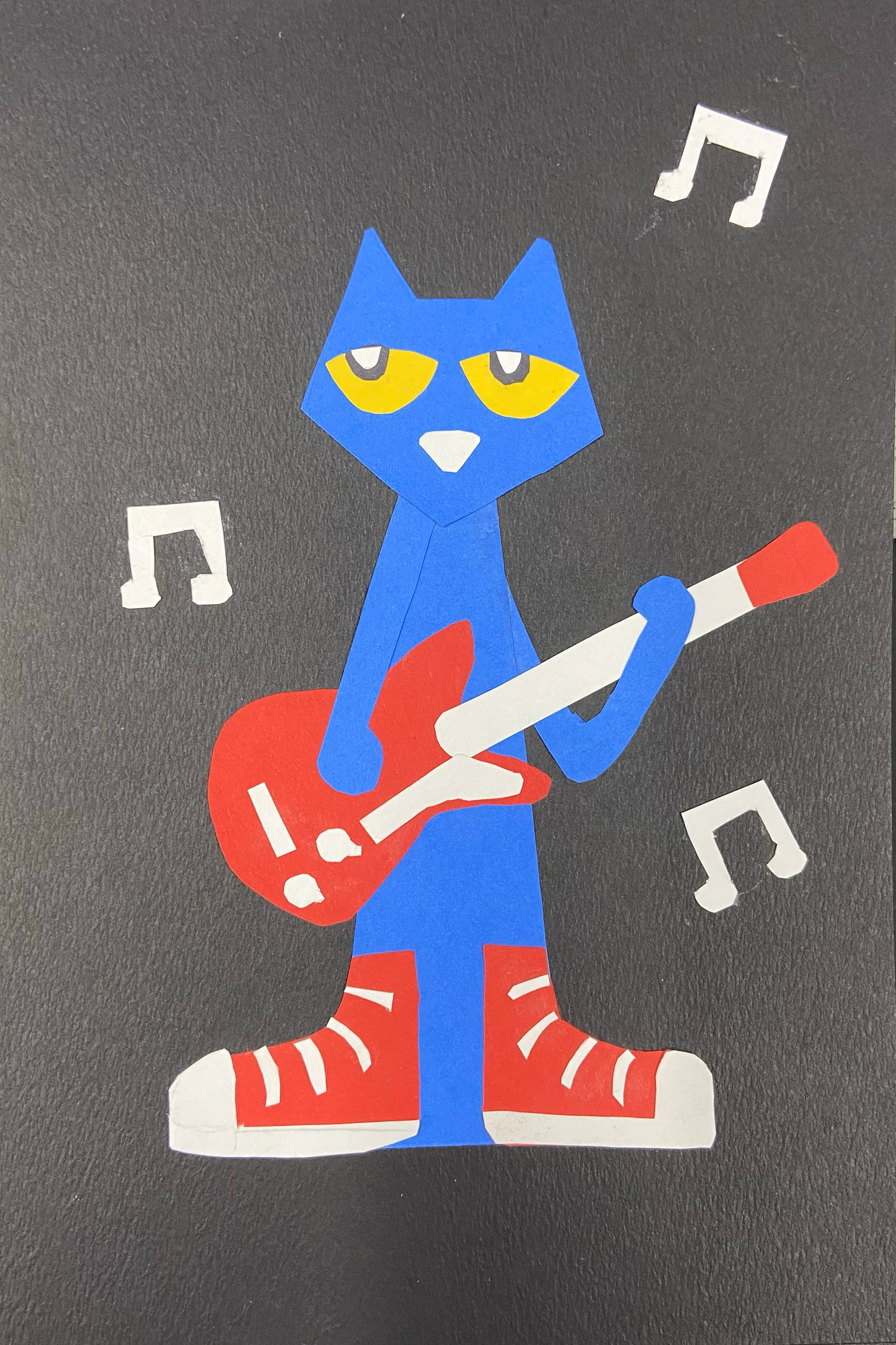 Ella Roeger - Collage made with organic shapes to create a character (Pete the Cat)