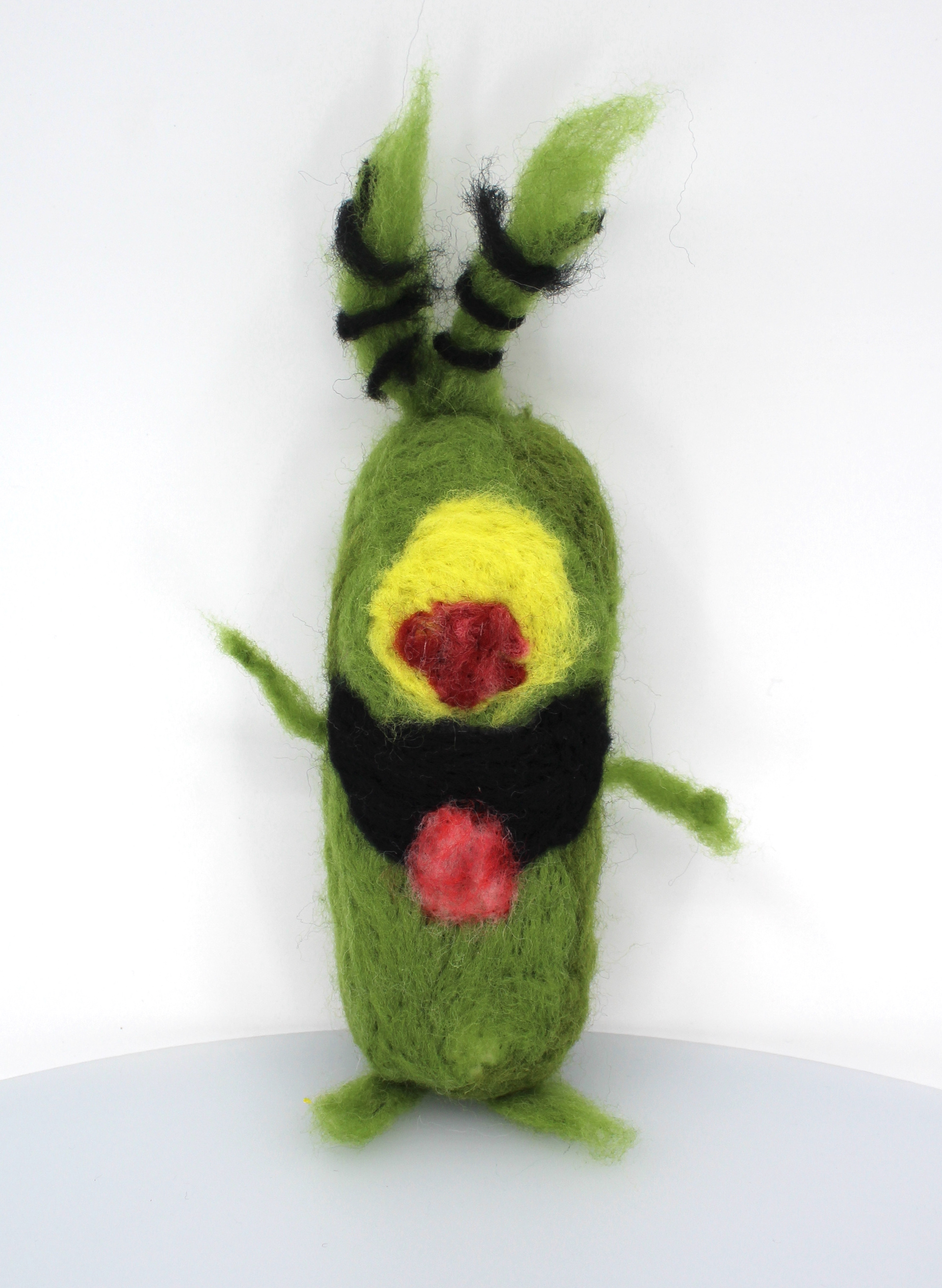 Michael Escobedo """Plankton"" Needle felting is like sculpting with wool! You use a special needle to poke and shape the wool fibers into different shapes and designs. I chose to create plankton because of his personality, and I also thought it was fun to create. I enjoyed doing this because it helped me experience new things in art that I never heard of before. "