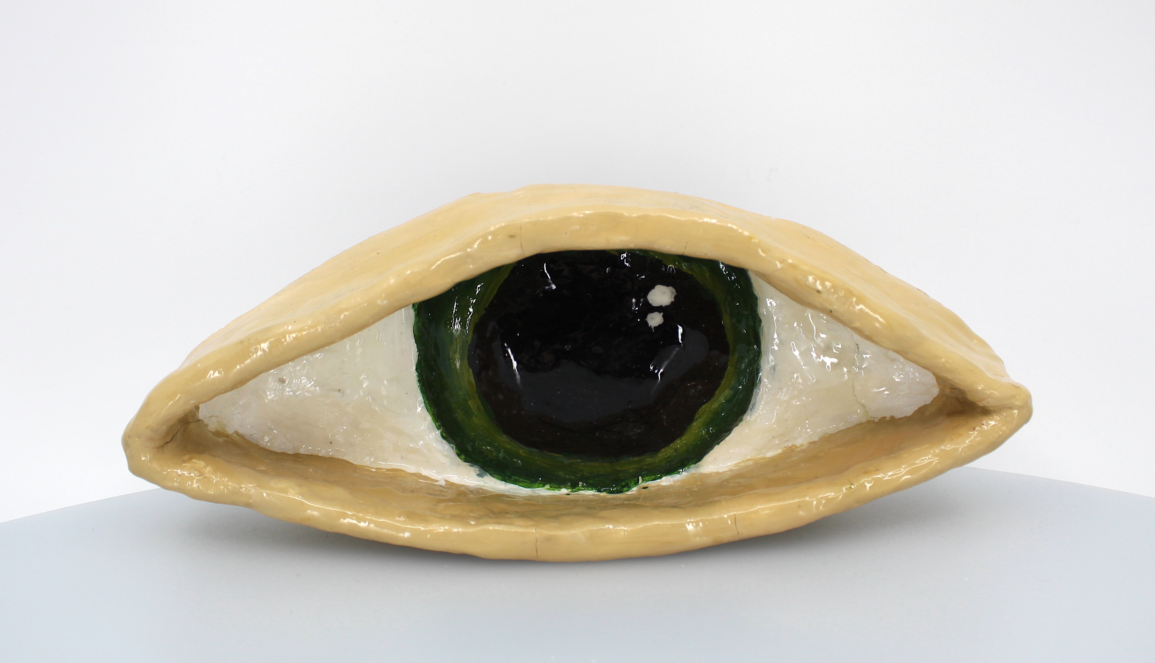 Dimari RodriguezI made this eye for the first friend Ive ever made. I made it out of the love I have for her and her lovely eyes. I made sure to check how my progress increased with the reality of the clay and her eye. I made sure I didn't miss how the eye shape and eye color were to make it realistic. I got my inspiration from her wisdom and motivation whenever I was working on any art work. I made this to show her how kindness can progress into receiving graditude.