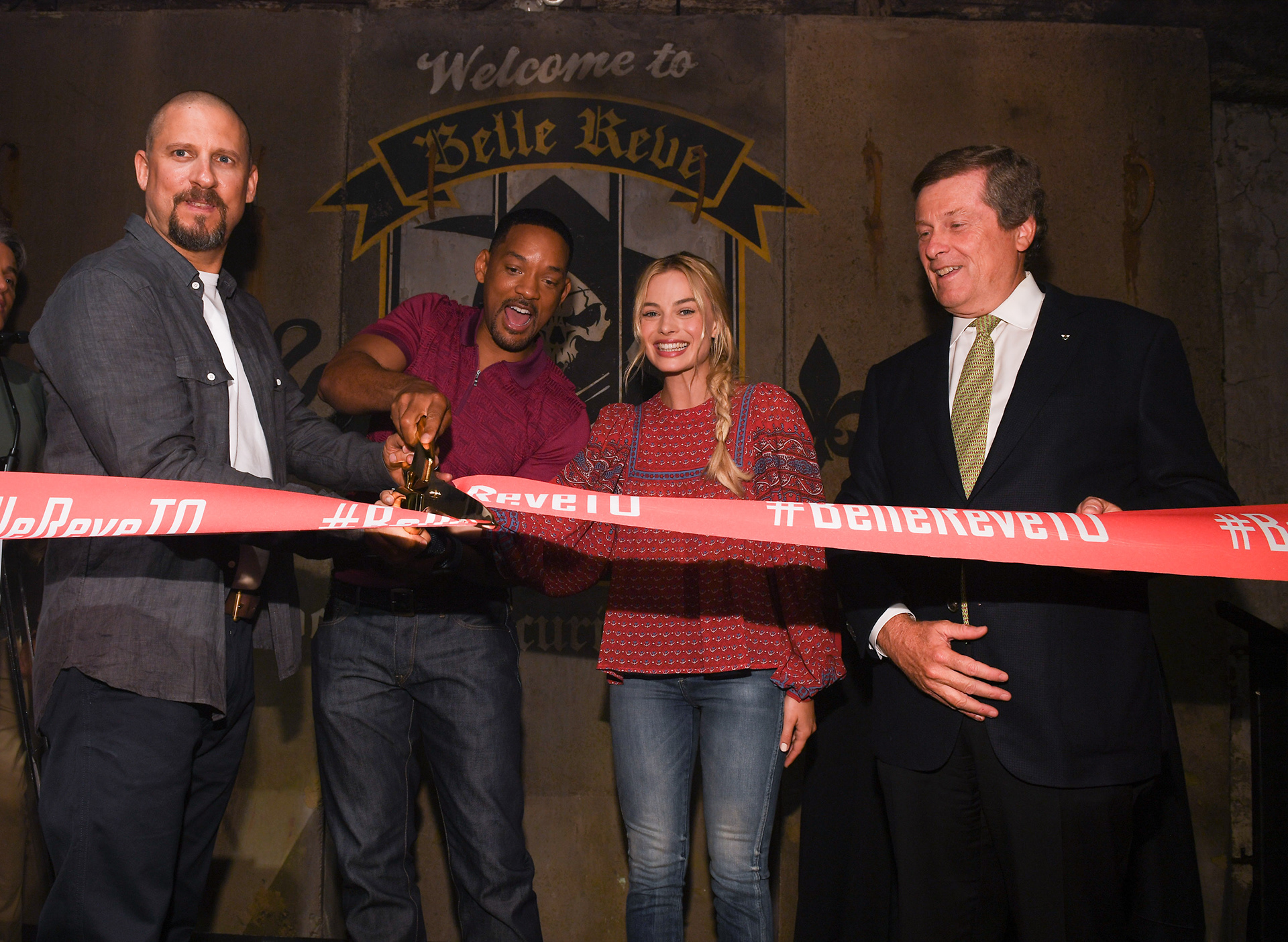 Director David Ayer, actor Will Smith, actress Margot Robbie and Toronto Mayor John Tory cut the ribbon to officially open #BelleReveTO.