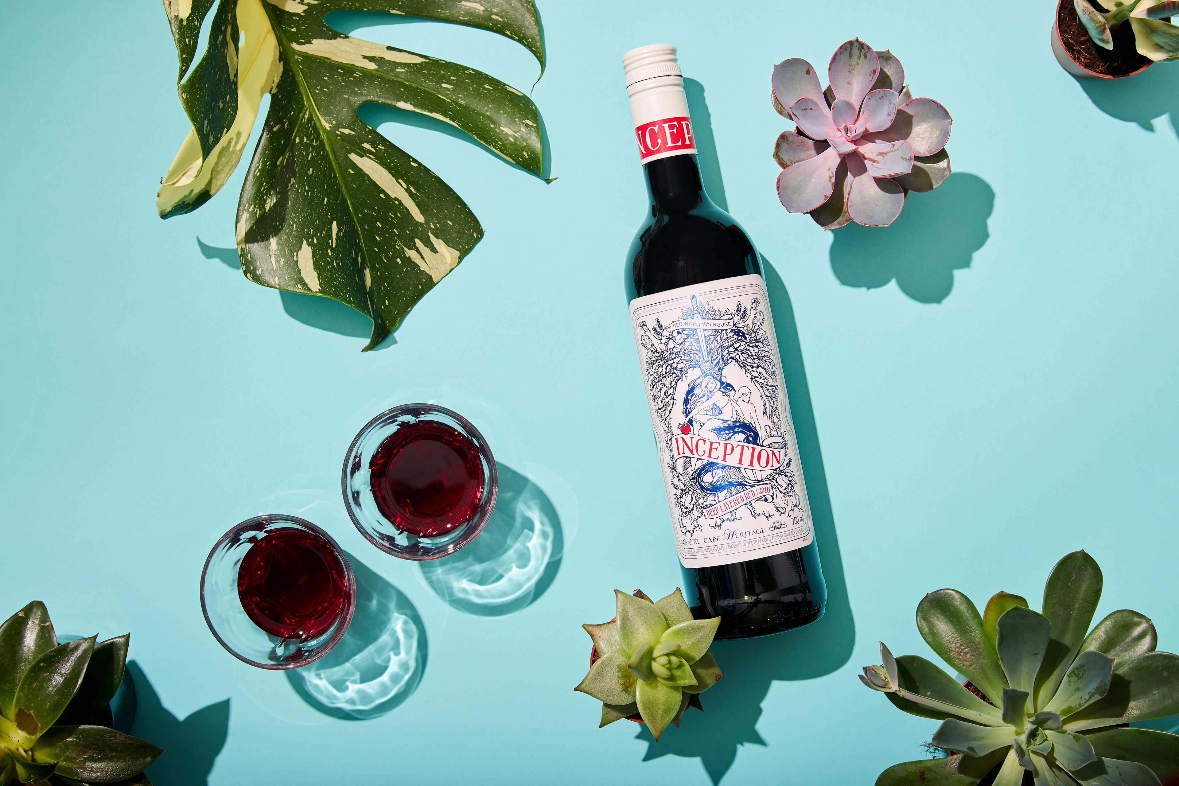 Inception Deep Layered Red wine bottle photographed in a studio setting