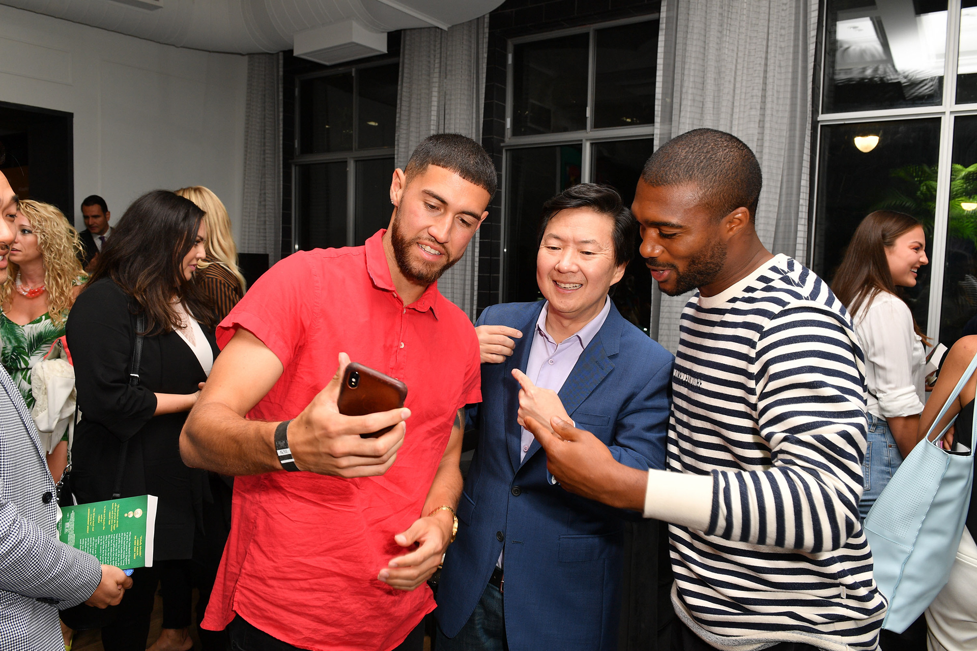 (L and R) TFC Soccer players Jonathan Osario, (M) actor Ken Jeong and (R) Ashtone Morgan attend the after party for the release of “Crazy Rich Asians” on July 30, 2018 held at The Maverick Social in Toronto, Canada. (Photo by George Pimentel/Getty Images for Warner Bros. Canada)
