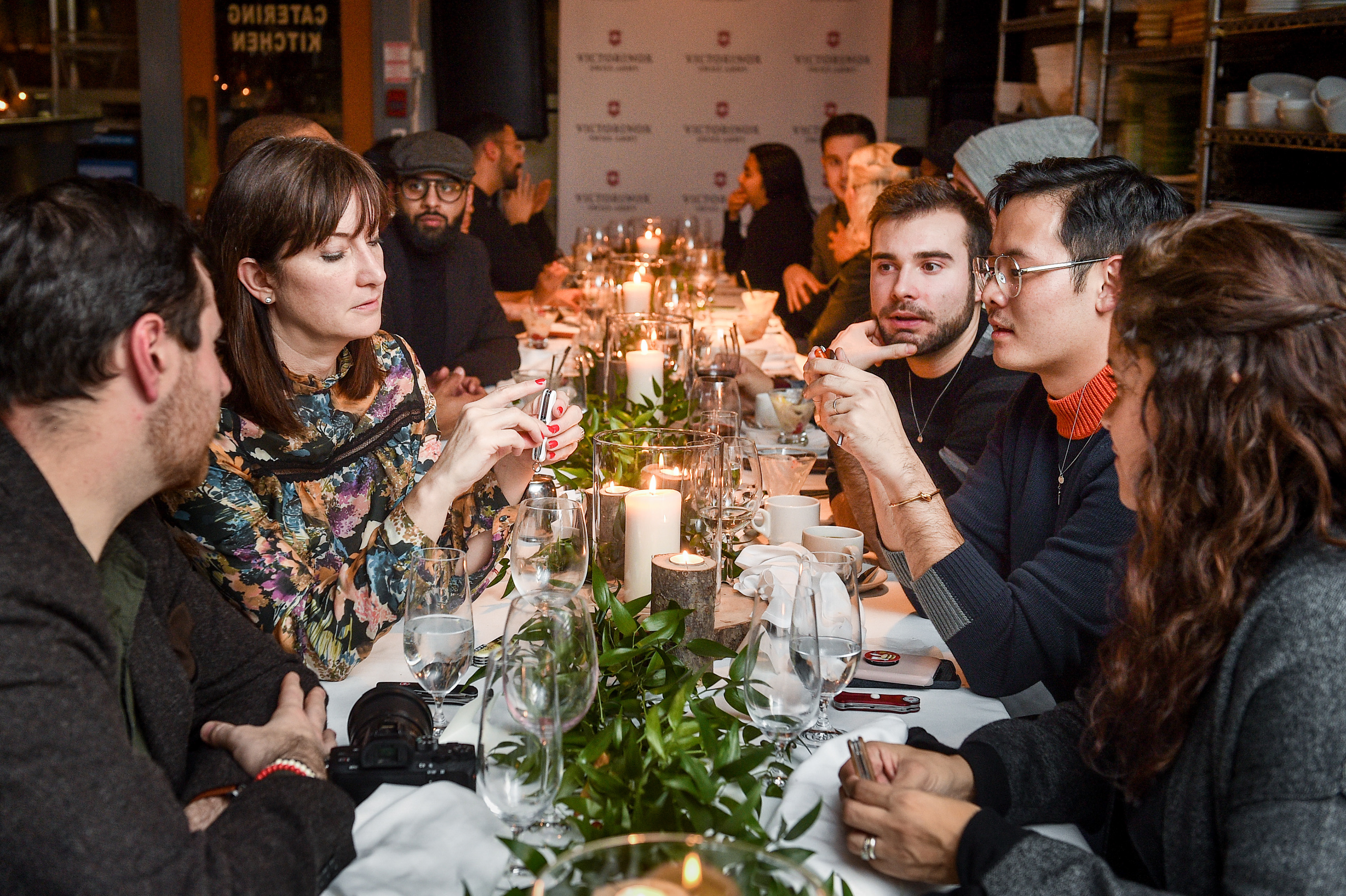 Guests discover Victorinox products at an exclusive holiday dinner.