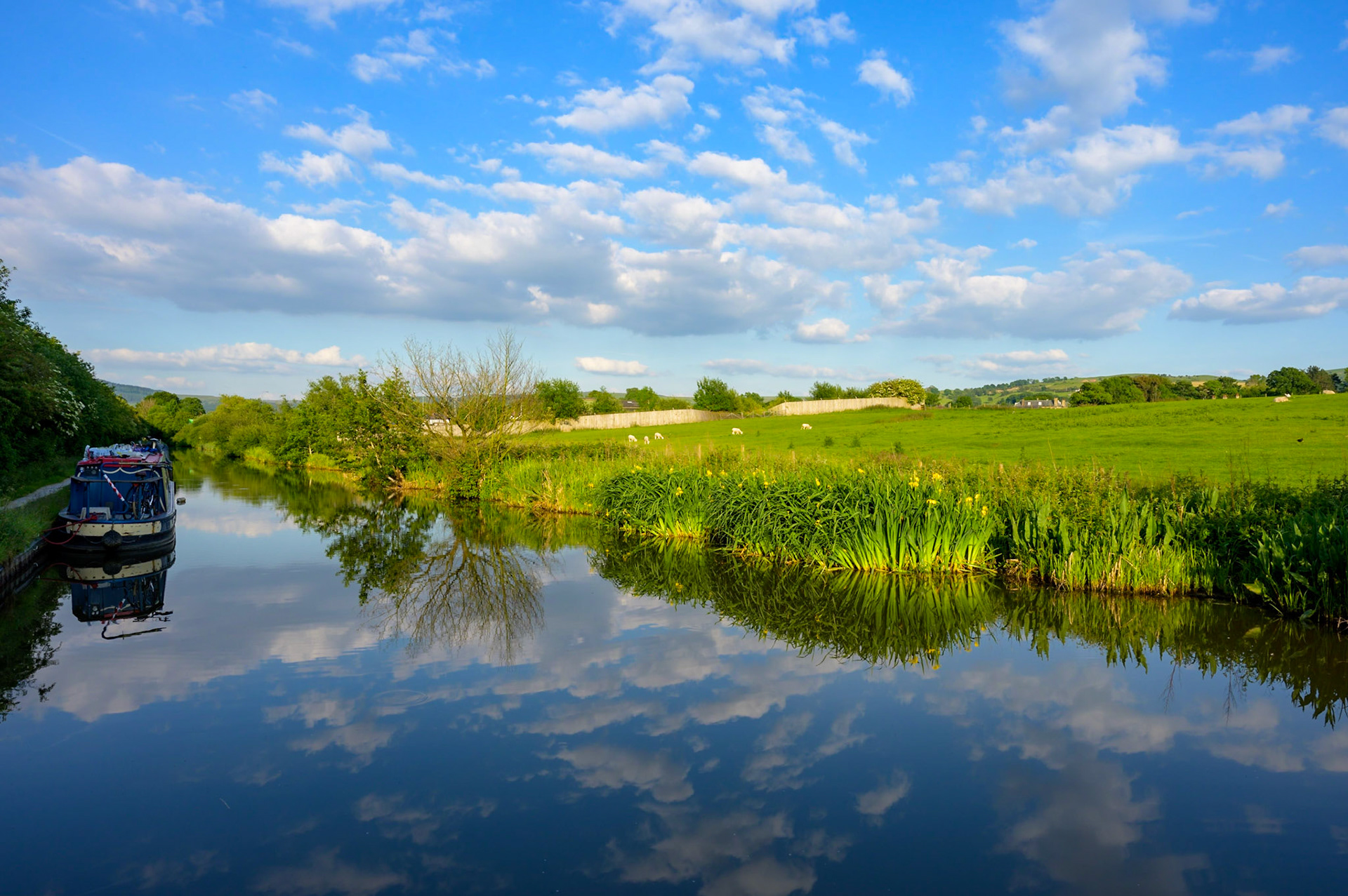 An early summer sky on the Macclesfield canal, UK.