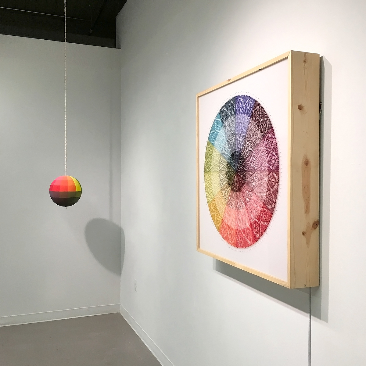 Farbenkugel #1, 2016, 36 x 36 x 6 inches, hand-knitted mohair stretched over lightbox