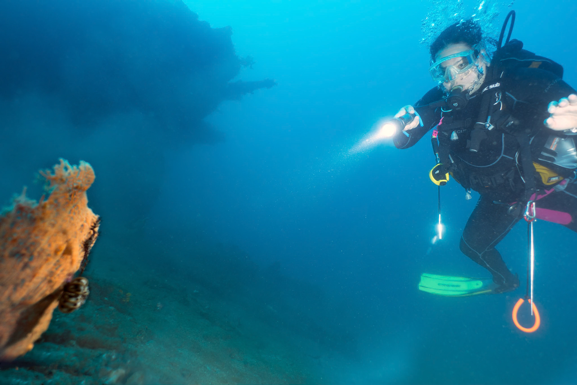 Fadilla finds a Ghost Pipefish in 40m at the bow of the Molas Wreck off Thalassa resort in Manado.