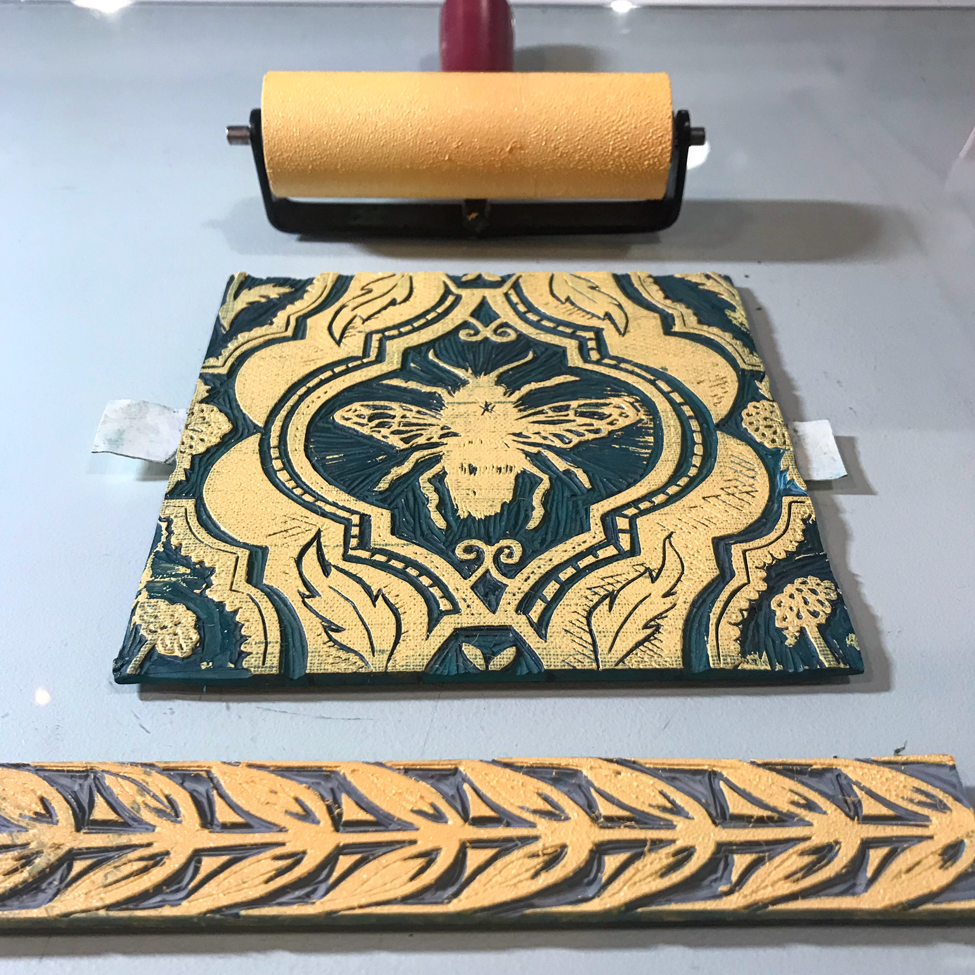 block printing a honey bee repeat pattern with speed ball fabric ink