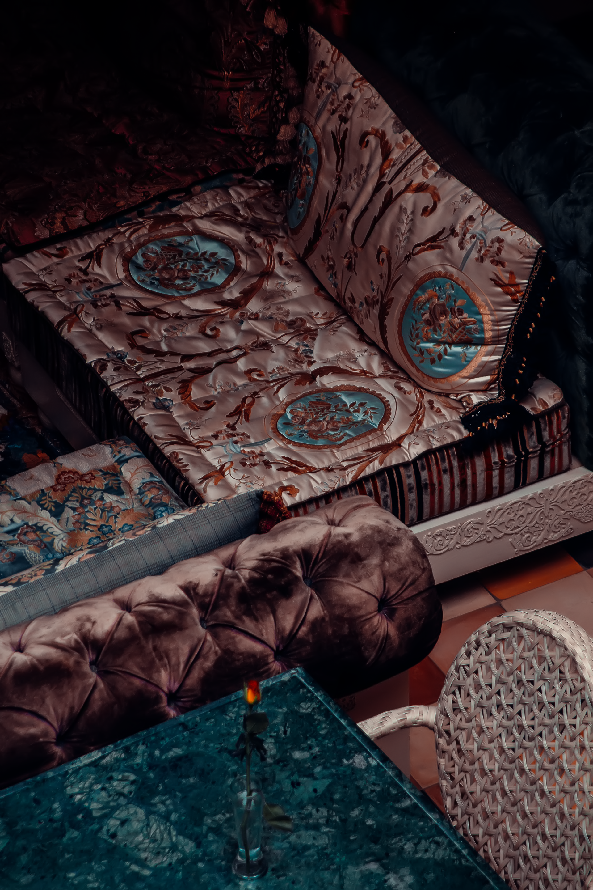 Temlyder — detail photography, traditional Moroccan patterned cushions and textiles, riad hospitality brand content