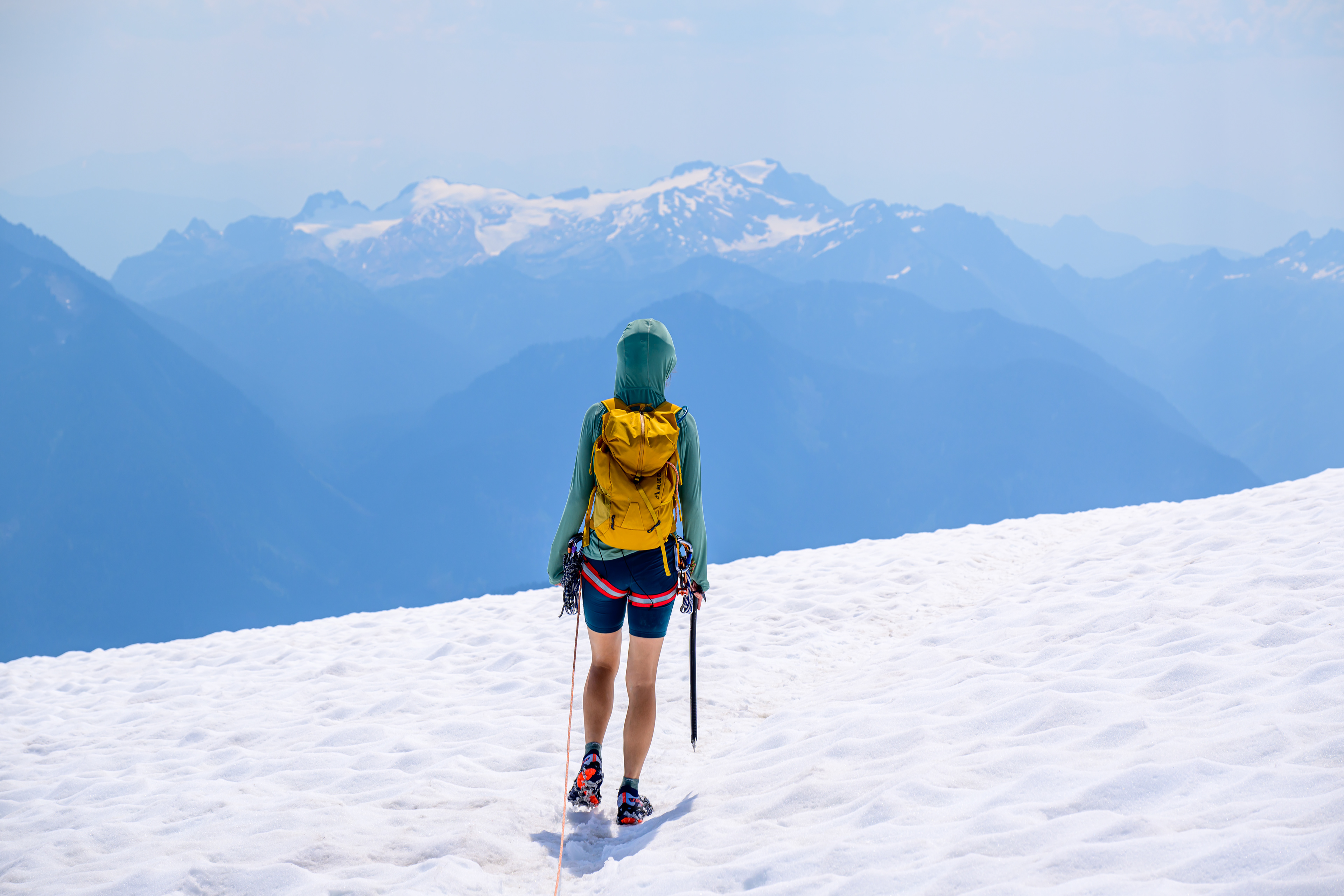 Jog down the mountain with rope and crampons