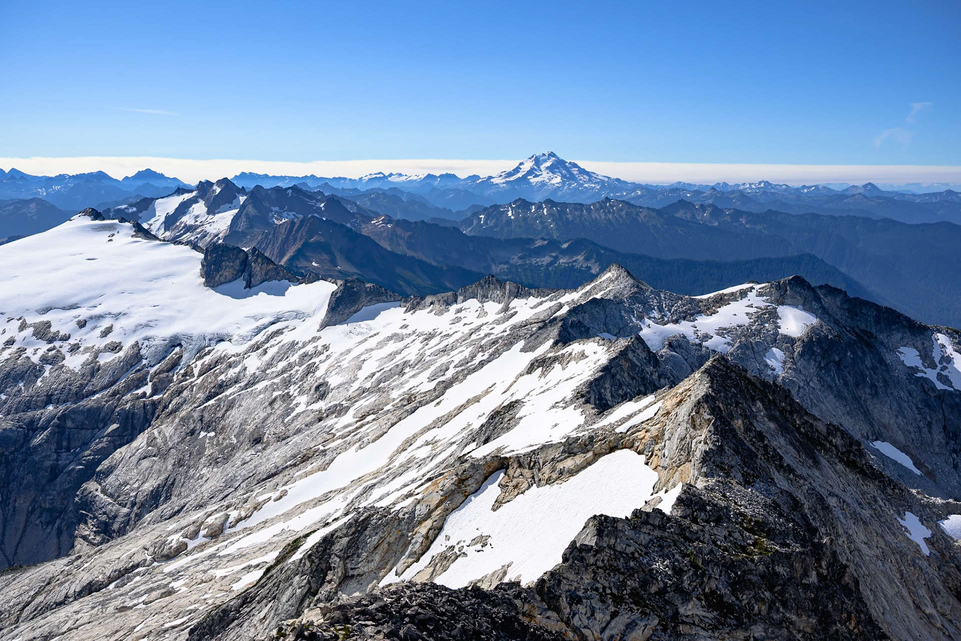 From summit of Snowking, looking at Glacier Peak. The "cloud" is the layer of smoke.
