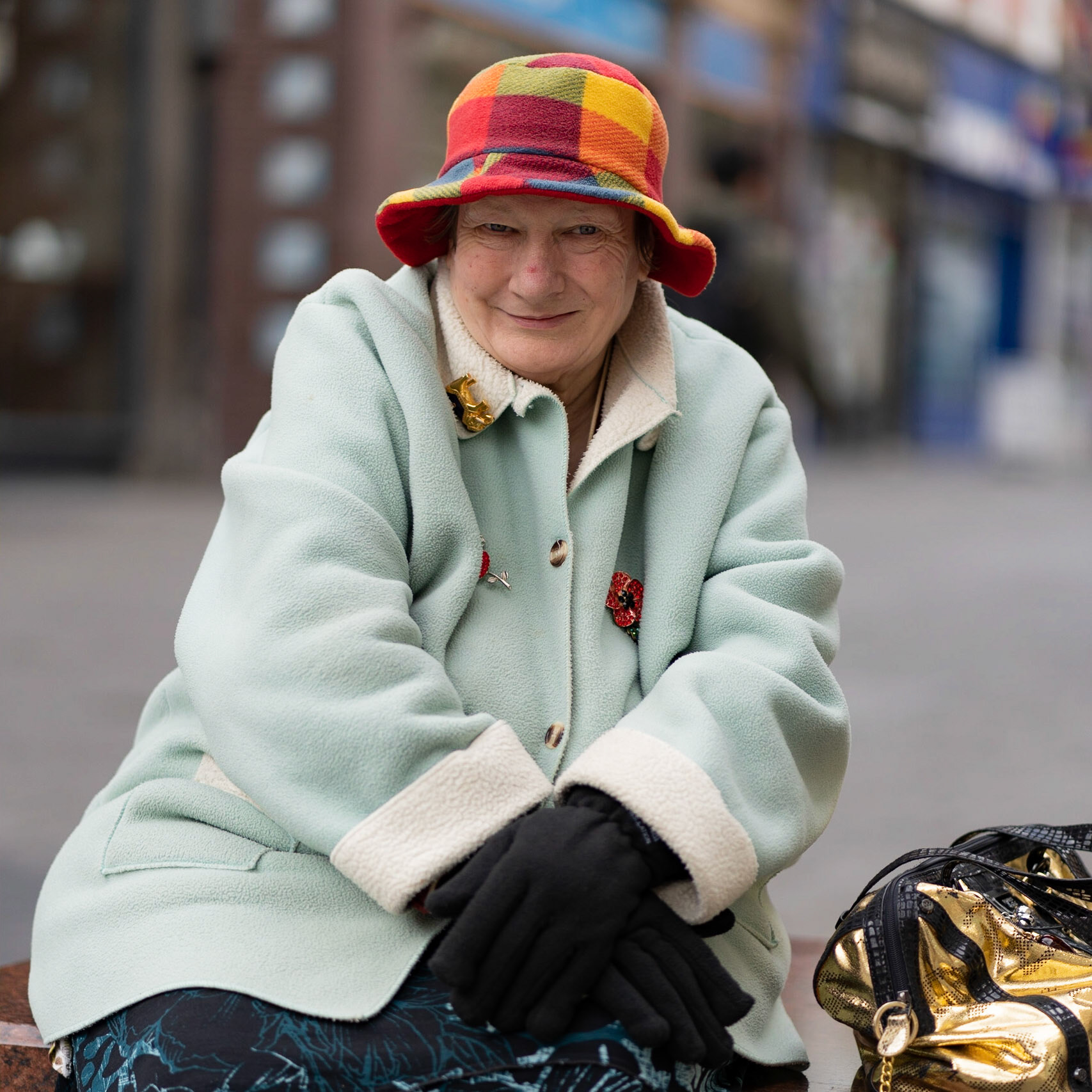 Taken in Leicester on a sunny day. This lady was on a bench and was so excited when i asked her for a photo.