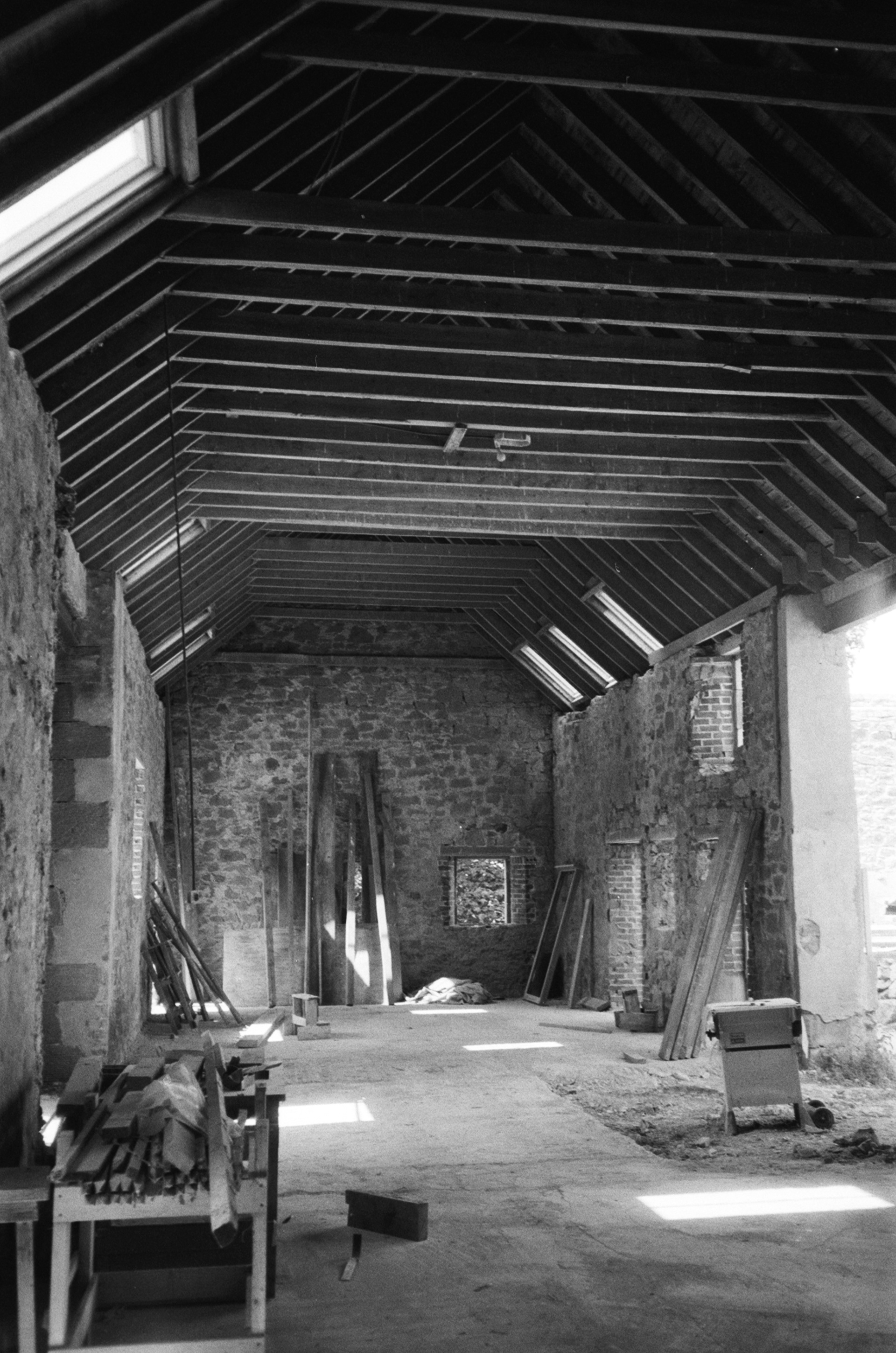 Interior existing Castle Moffat Steading Long Barn historic listed building conversion restoration architecture by Croftworks in East Lothian Scotland retrofit stone farm buildings