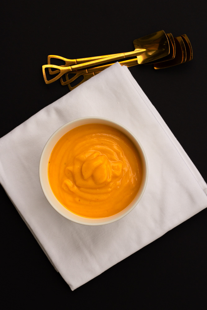 Pumpkin soup with 4 golden spoons